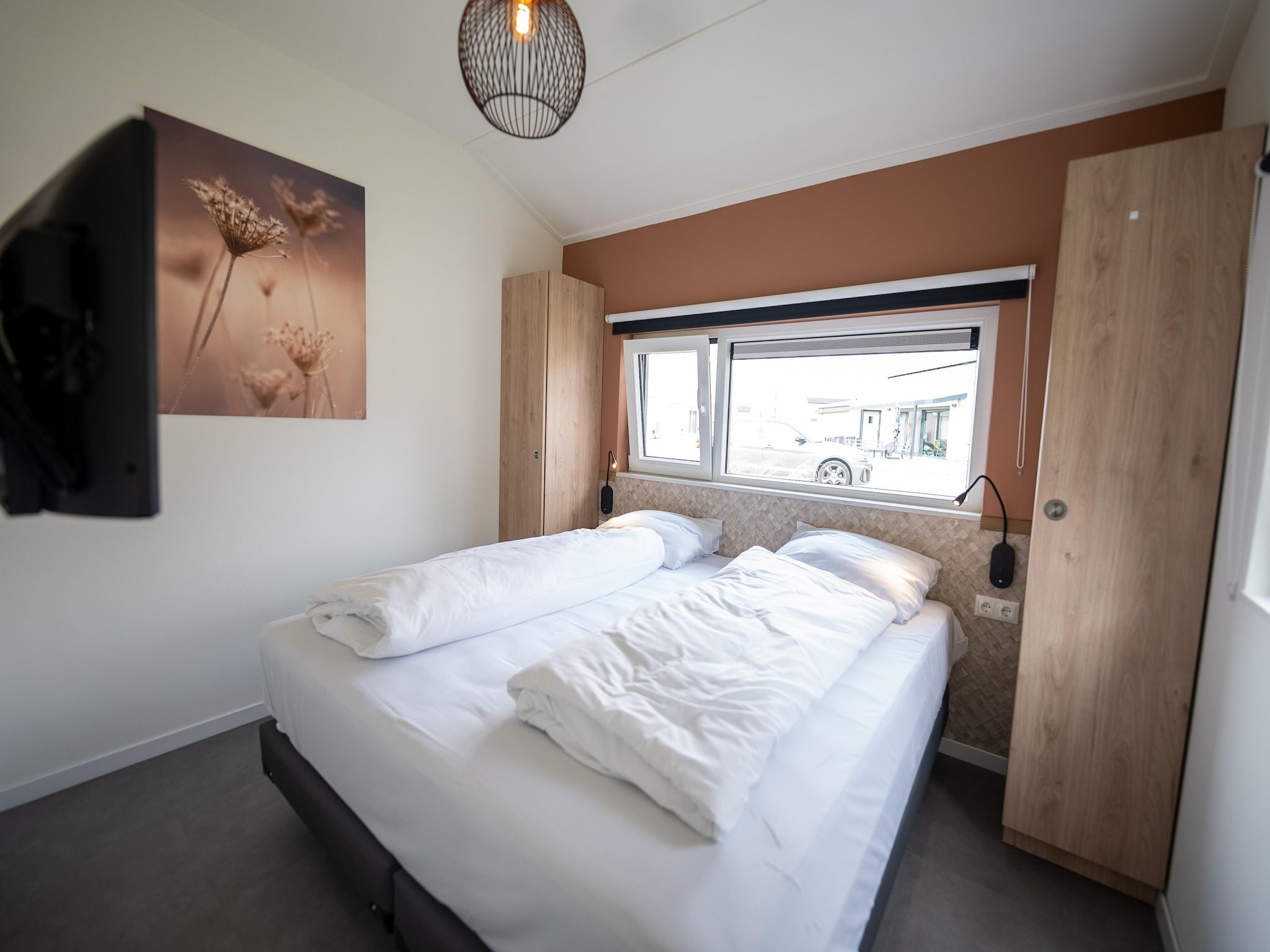 Een slaapkamer van Vakantiepark Zeebad 18 in Breskens