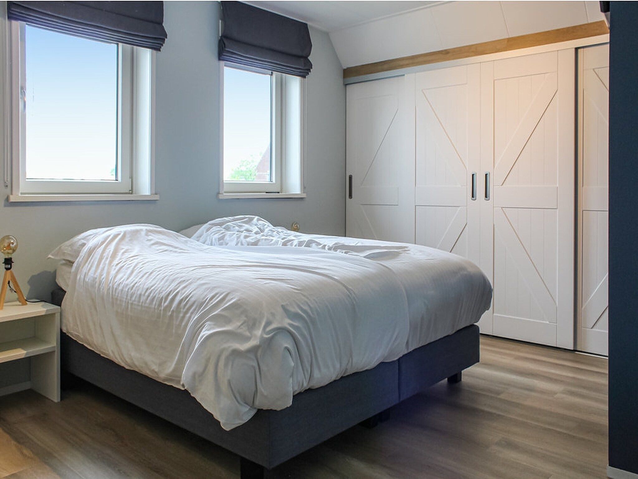 Een slaapkamer van Recreatiepark Idskenhuizen 1 in Idskenhuizen