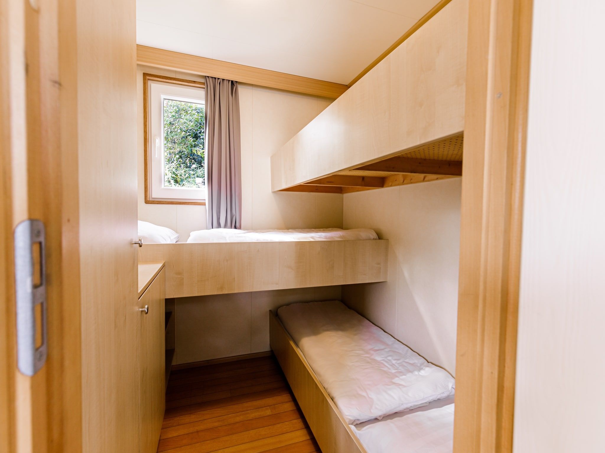 Een slaapkamer van Vakantiepark Leukermeer 2 in Well