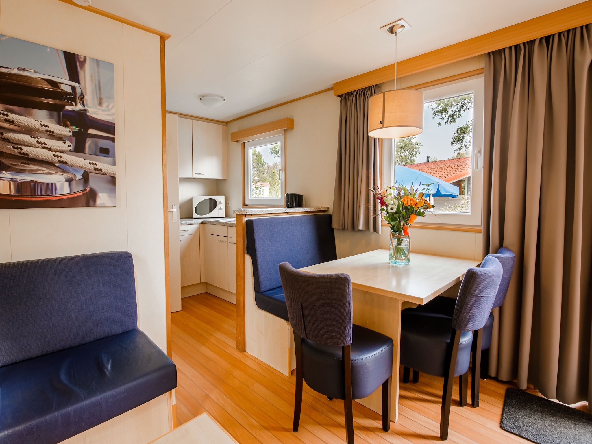 De woonkamer van Vakantiepark Leukermeer 2 in Well