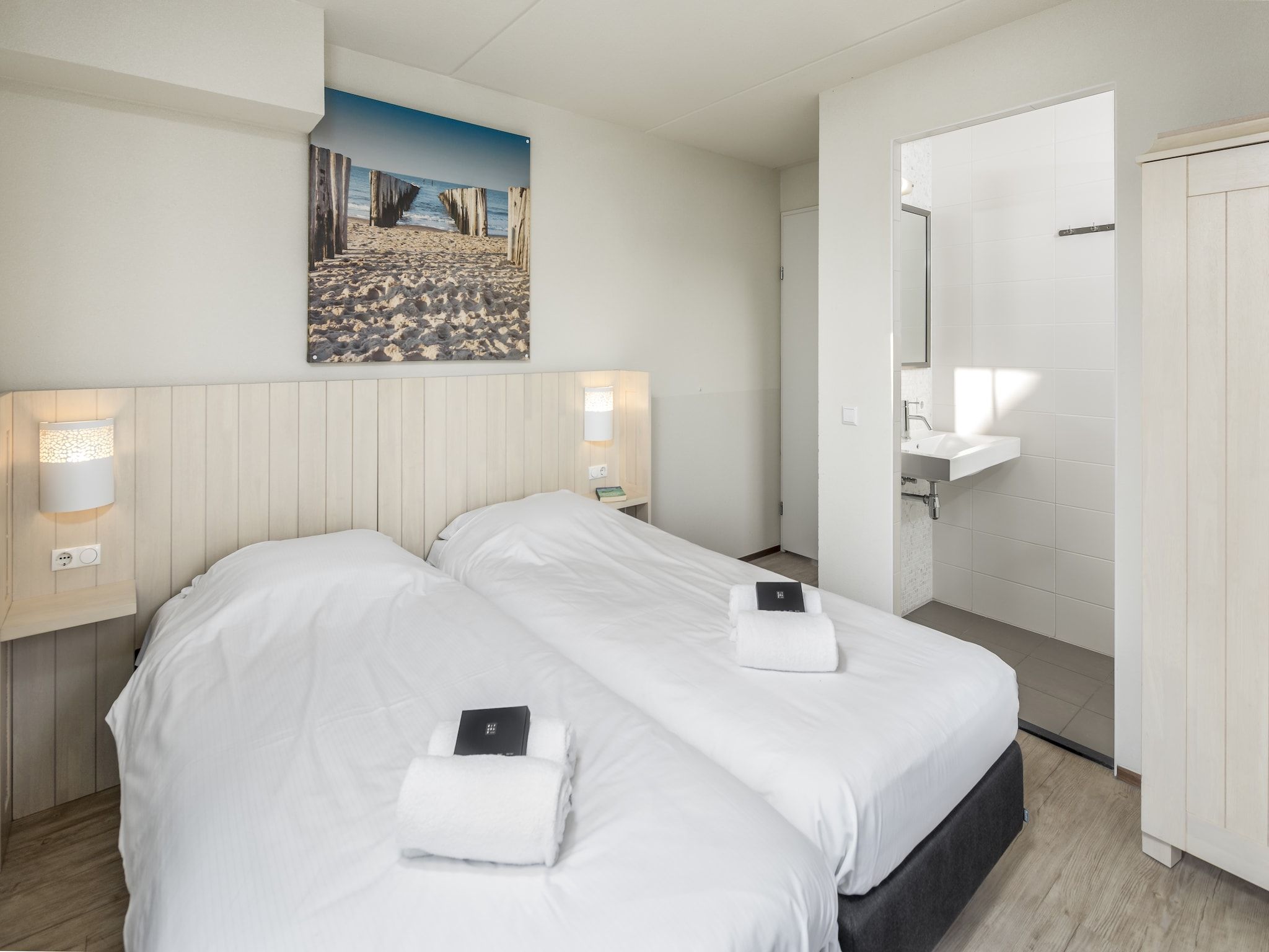 Een slaapkamer van Noordzee Résidence Cadzand-Bad 21 in Cadzand-Bad