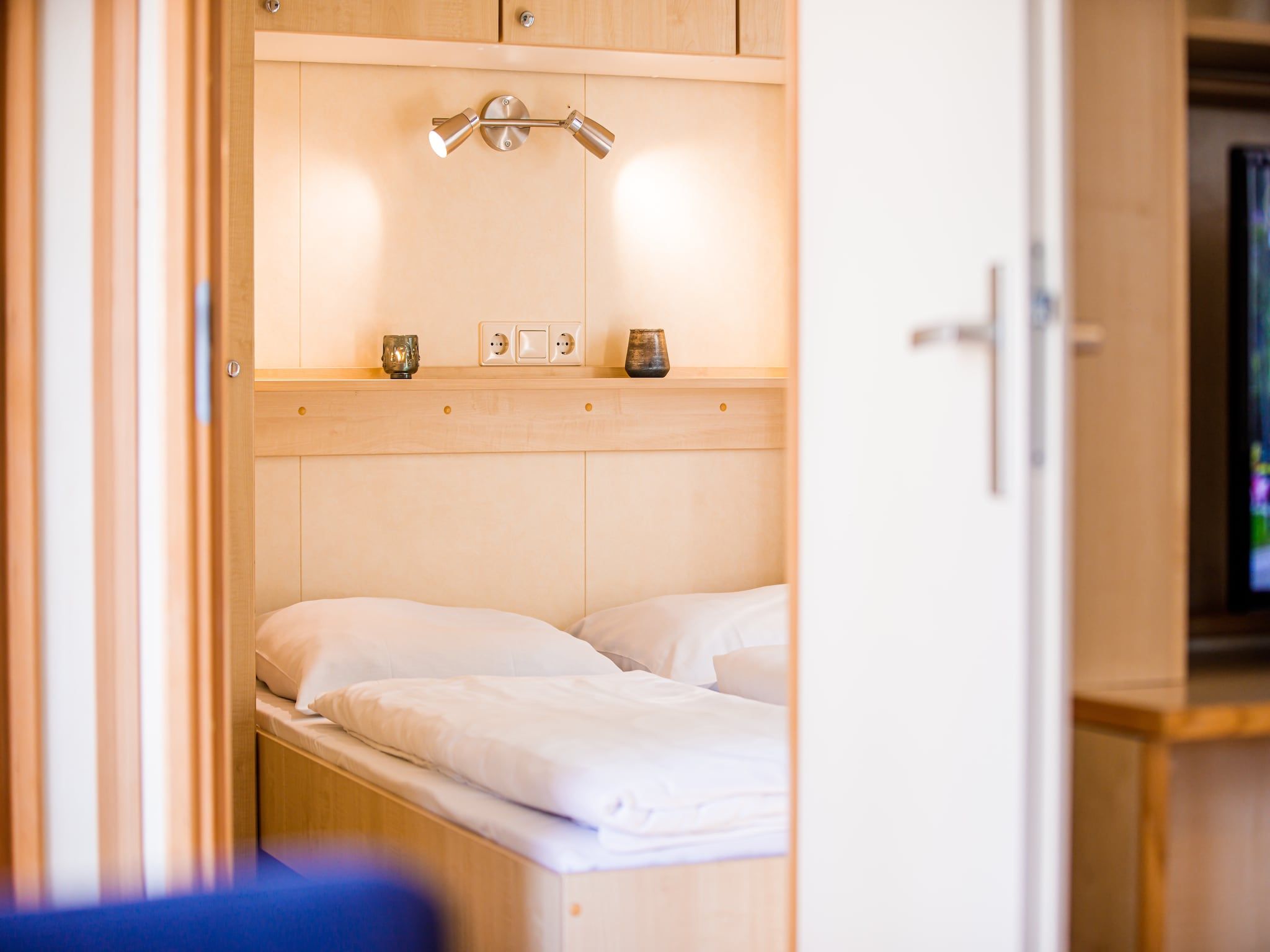 Een slaapkamer van Vakantiepark Leukermeer 4 in Well