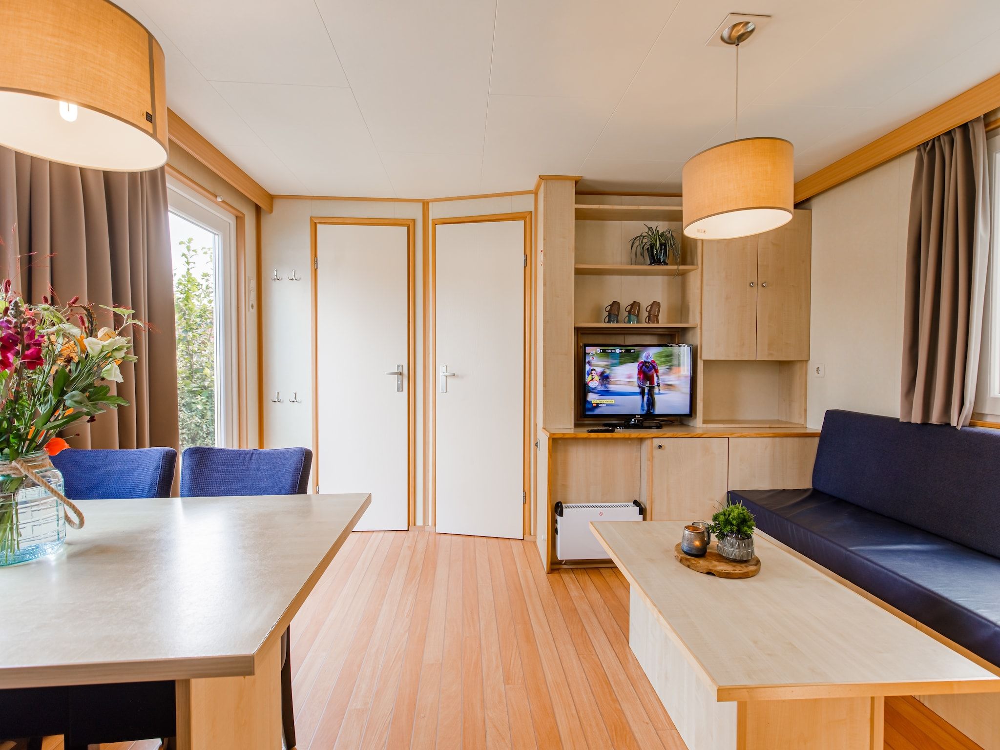 De woonkamer van Vakantiepark Leukermeer 5 in Well