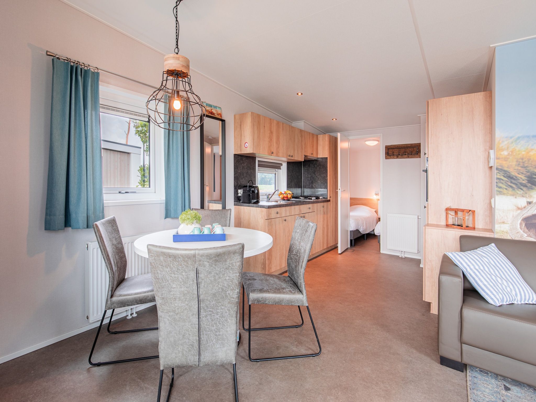 De woonkamer van Vakantiepark Leukermeer 9 in Well