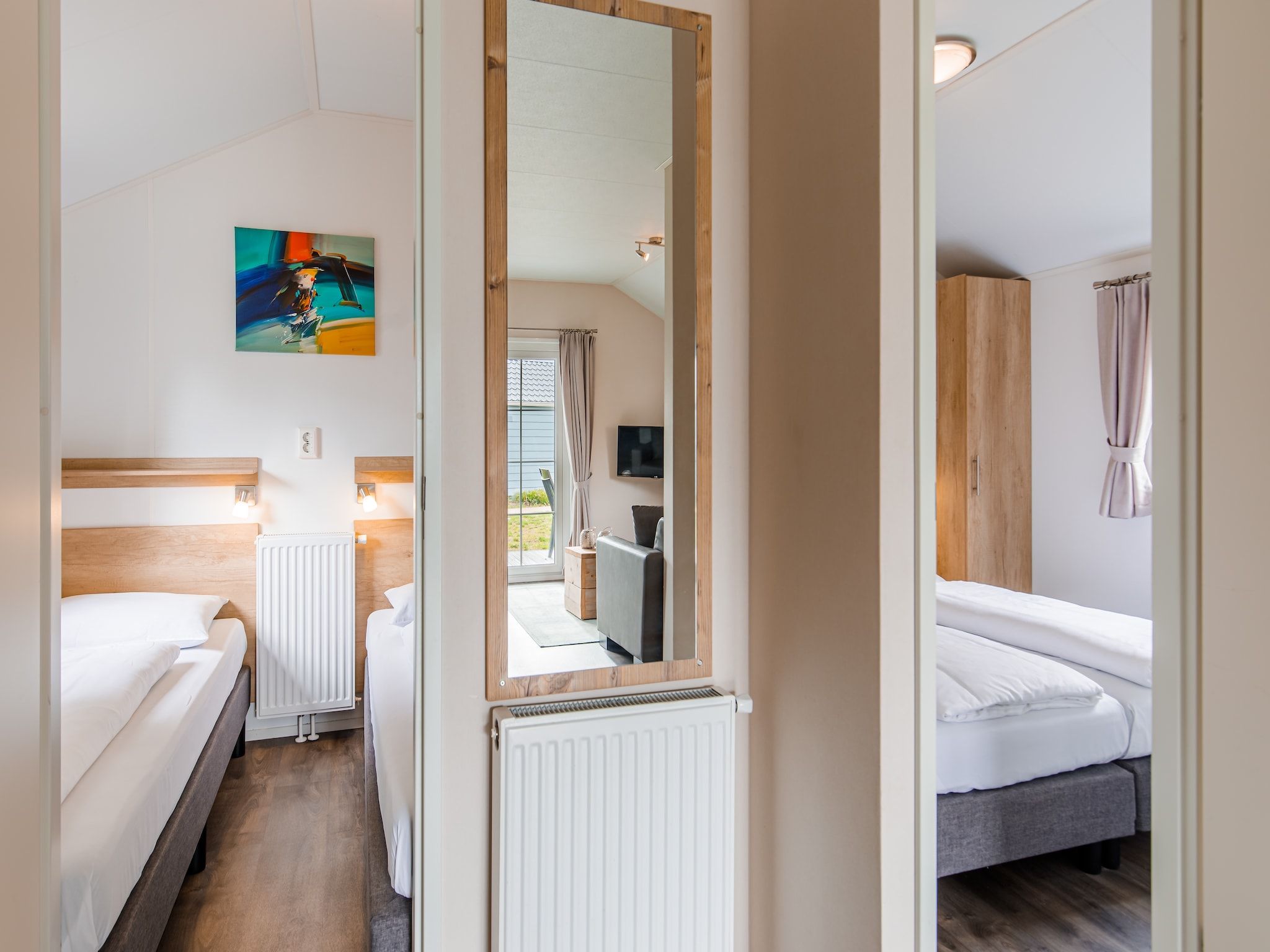 Een slaapkamer van Vakantiepark Leukermeer 11 in Well