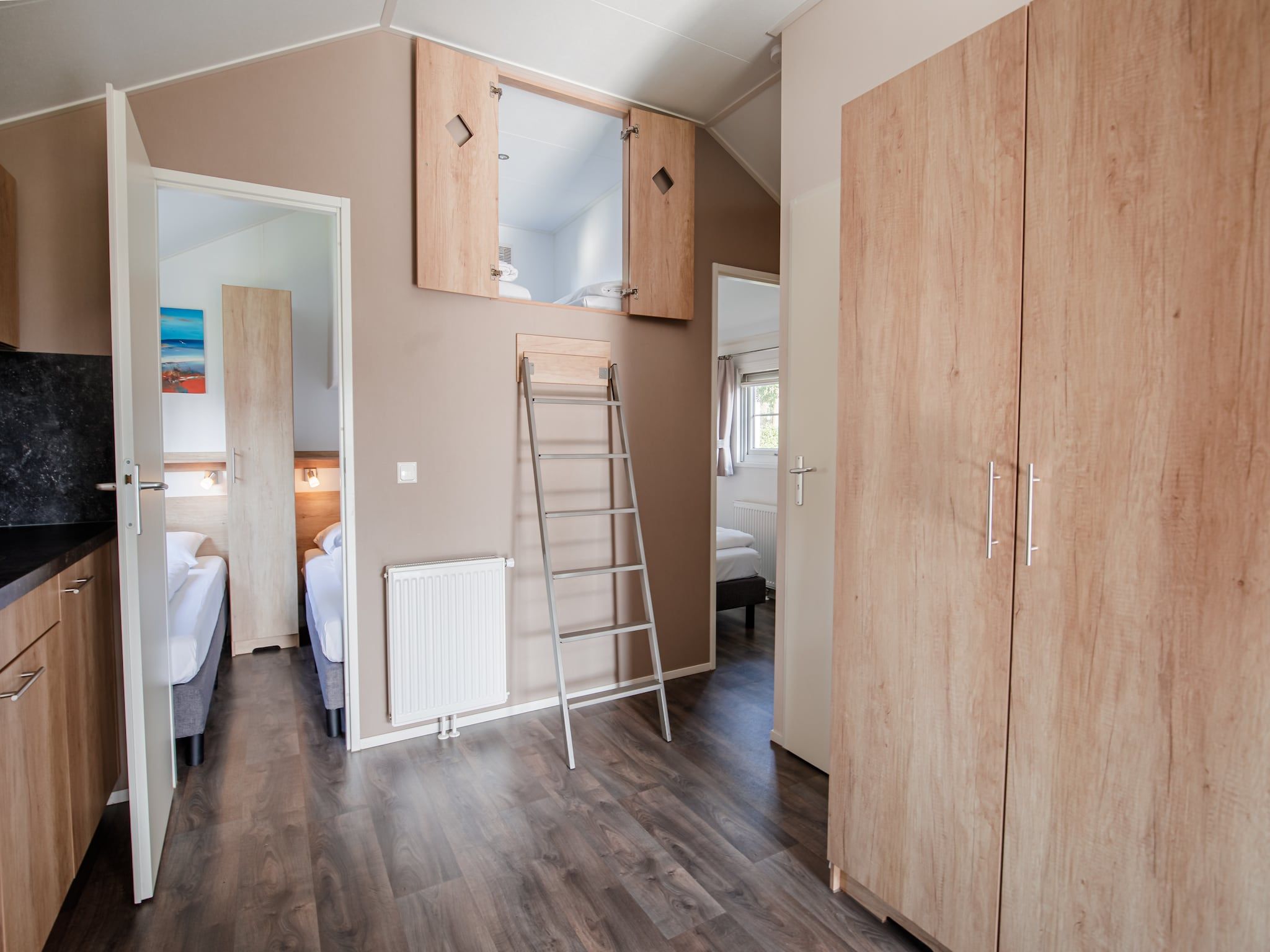 De woonkamer van Vakantiepark Leukermeer 12 in Well