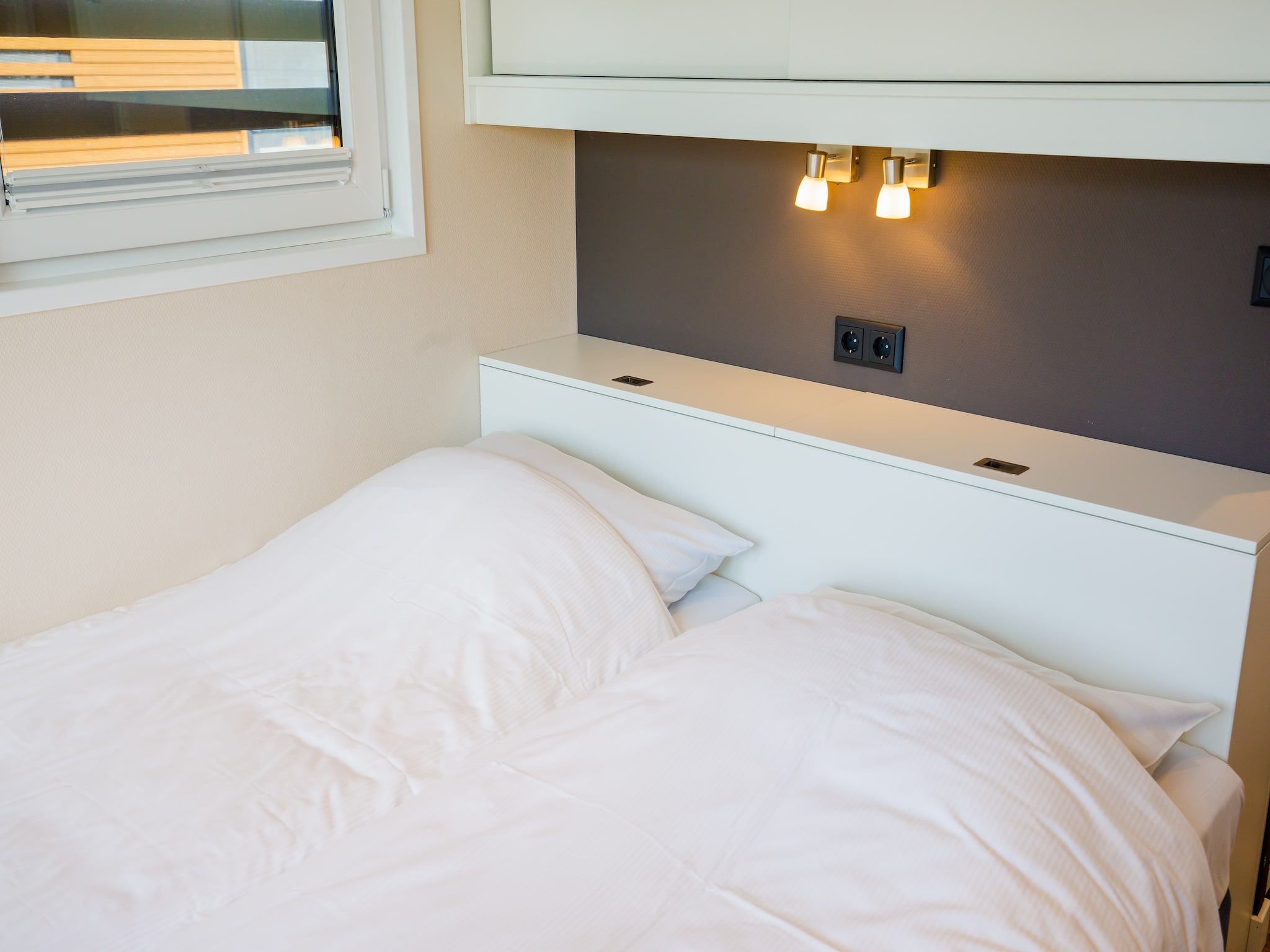 Een slaapkamer van Vakantiepark Leukermeer 9 in Well