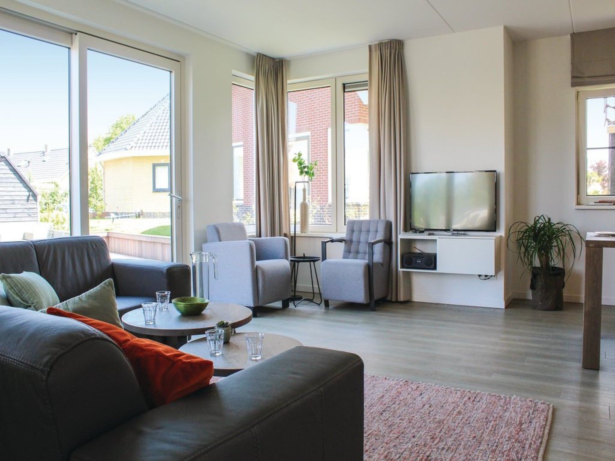 De woonkamer van Recreatiepark Idskenhuizen 5 in Idskenhuizen