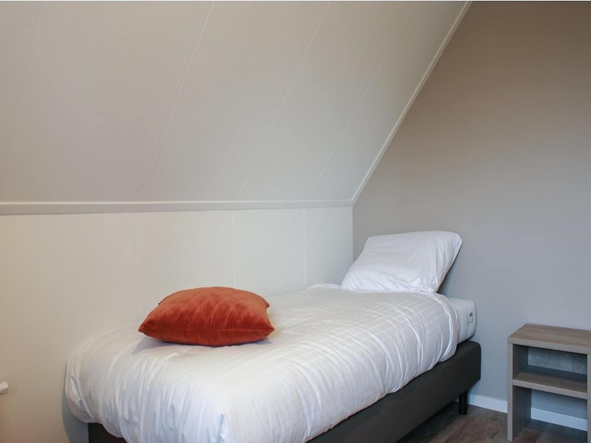 Een slaapkamer van Recreatiepark Idskenhuizen 6 in Idskenhuizen