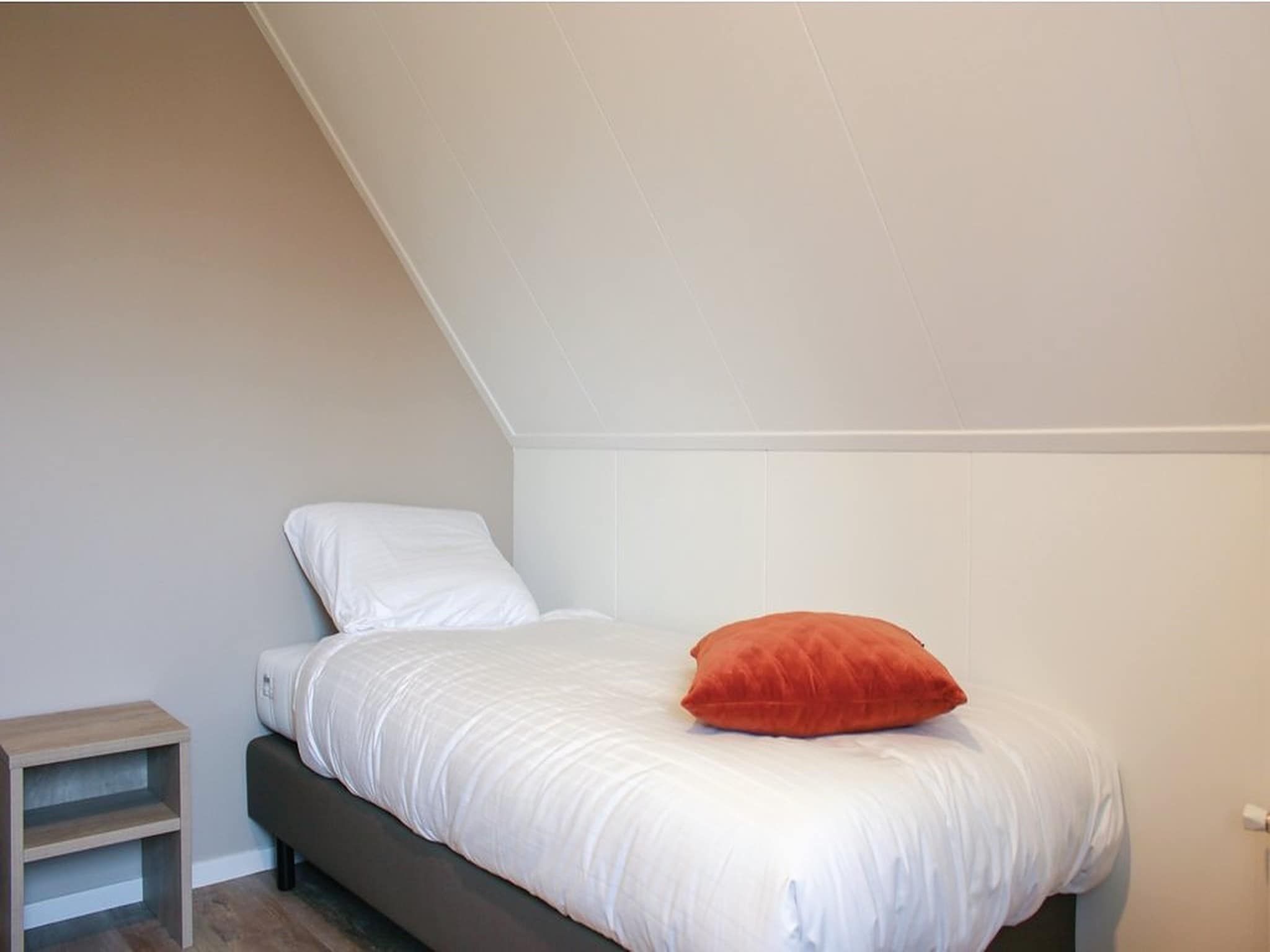 Een slaapkamer van Recreatiepark Idskenhuizen 7 in Idskenhuizen