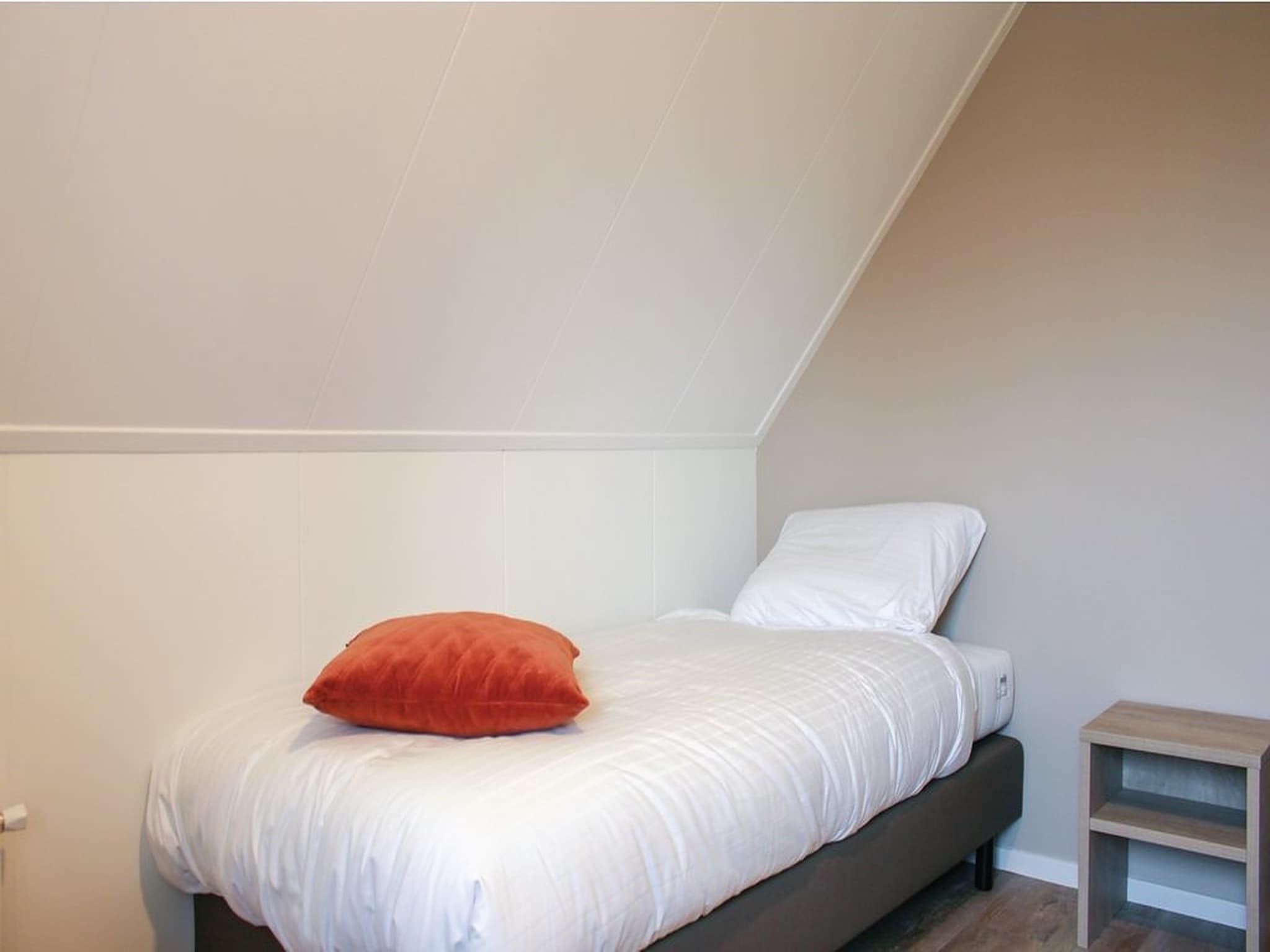 Een slaapkamer van Recreatiepark Idskenhuizen 7 in Idskenhuizen