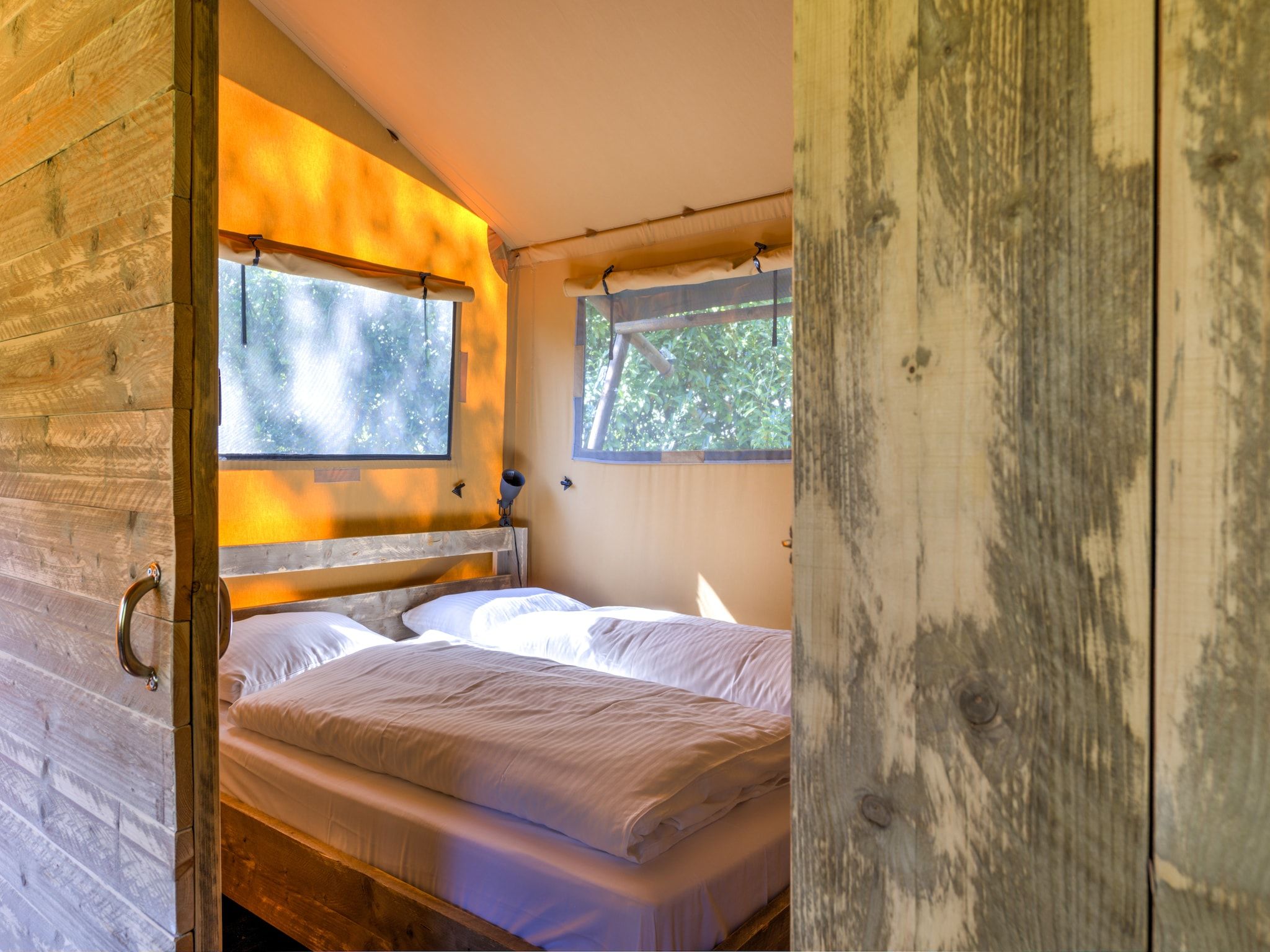 Een slaapkamer van Buitenplaats Gerner 8 in Dalfsen