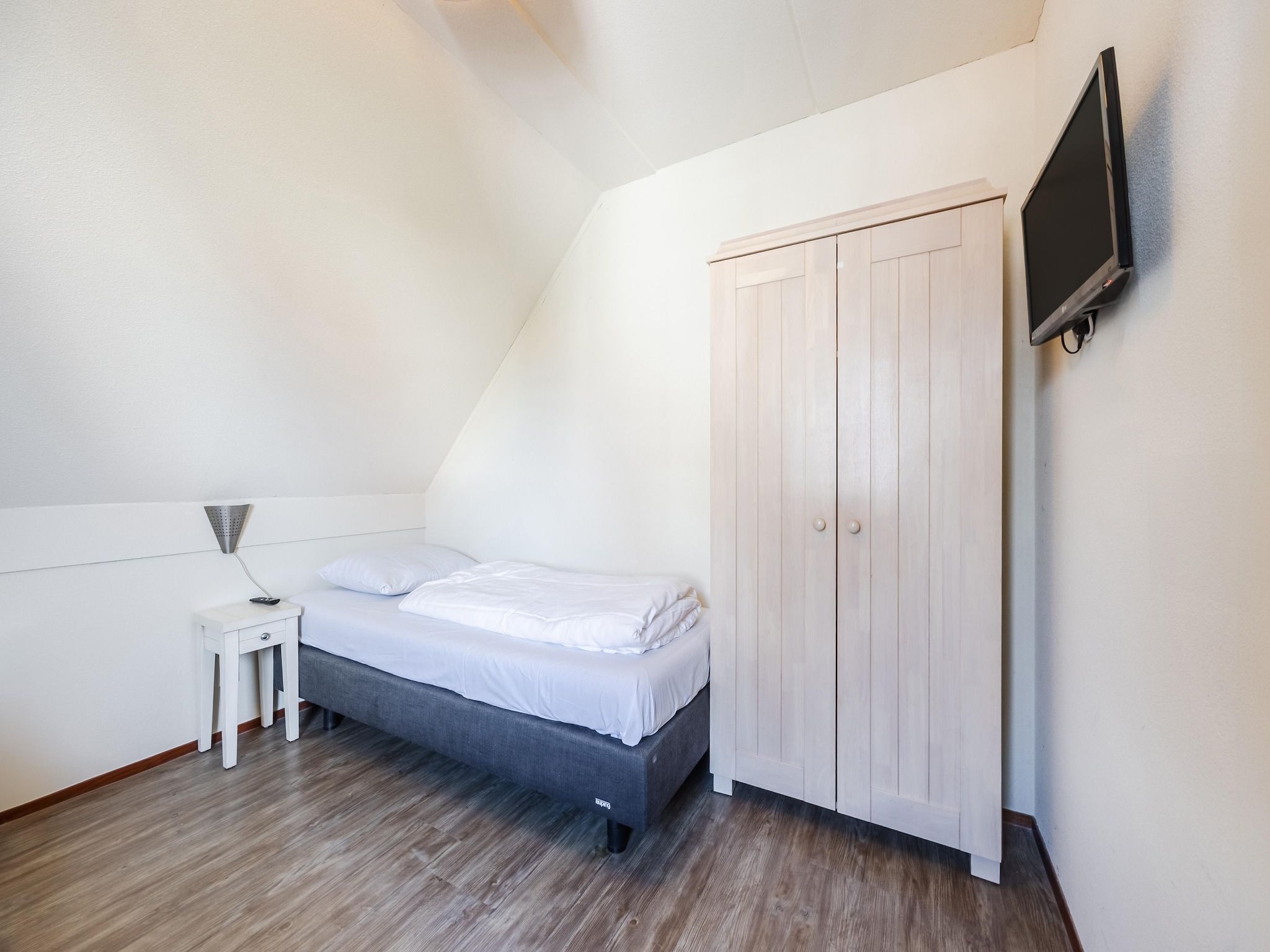 Een slaapkamer van Noordzee Residence Cadzand-Bad 23 in Cadzand-Bad