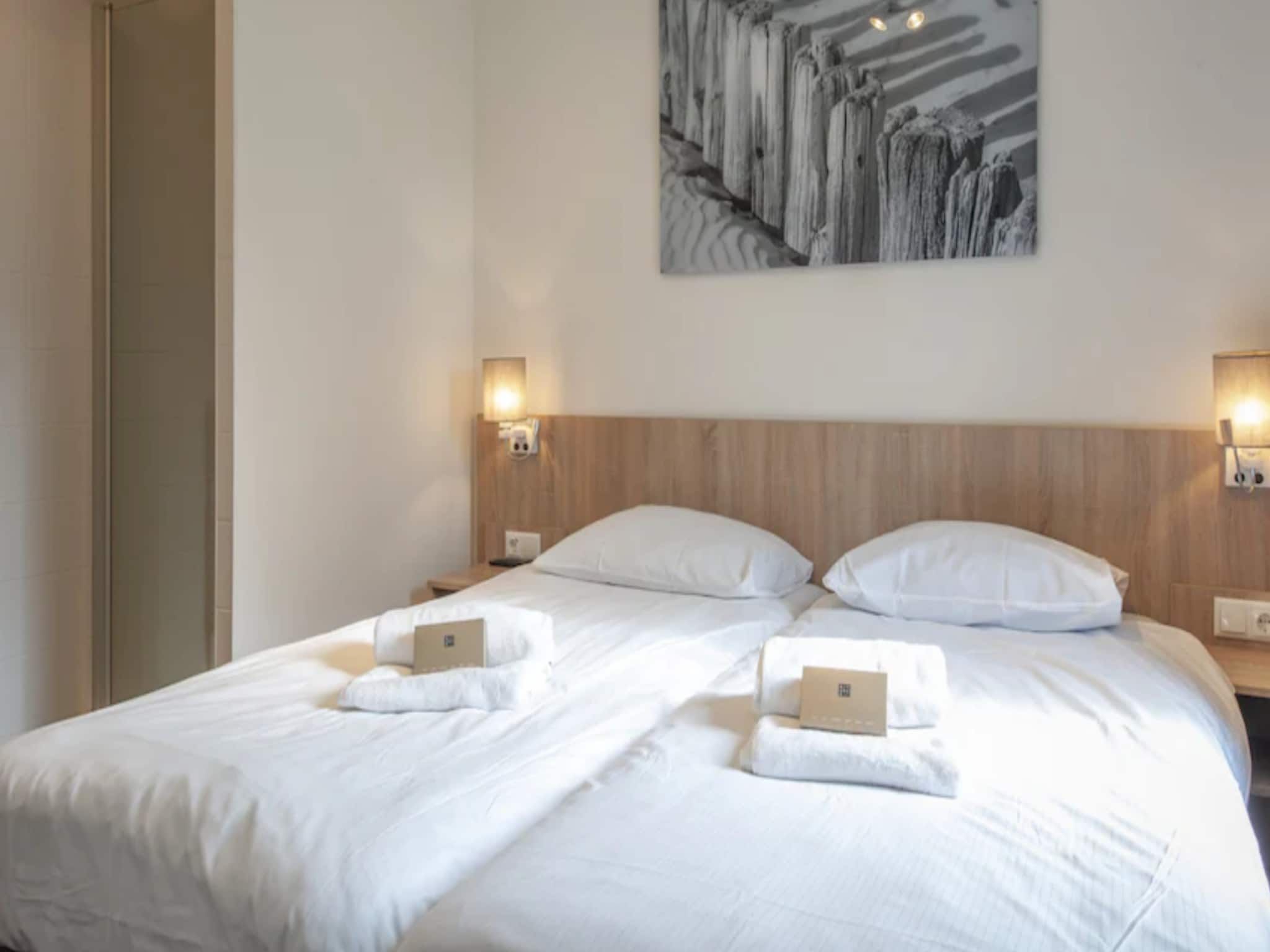 Een slaapkamer van Noordzee Residence Cadzand-Bad 25 in Cadzand-Bad