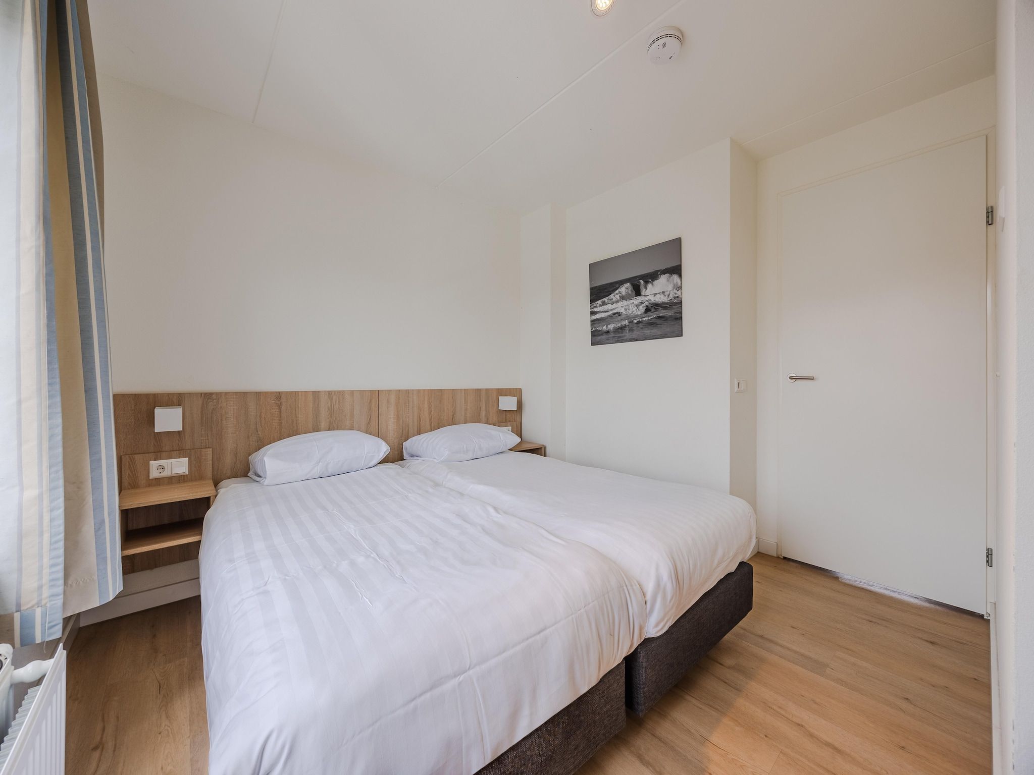 Een slaapkamer van Noordzee Residence Cadzand-Bad 25 in Cadzand-Bad