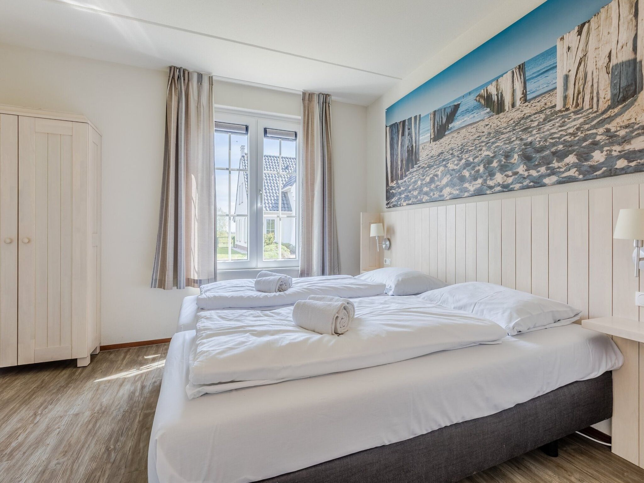 Een slaapkamer van Noordzee Residence Cadzand-Bad 26 in Cadzand-Bad