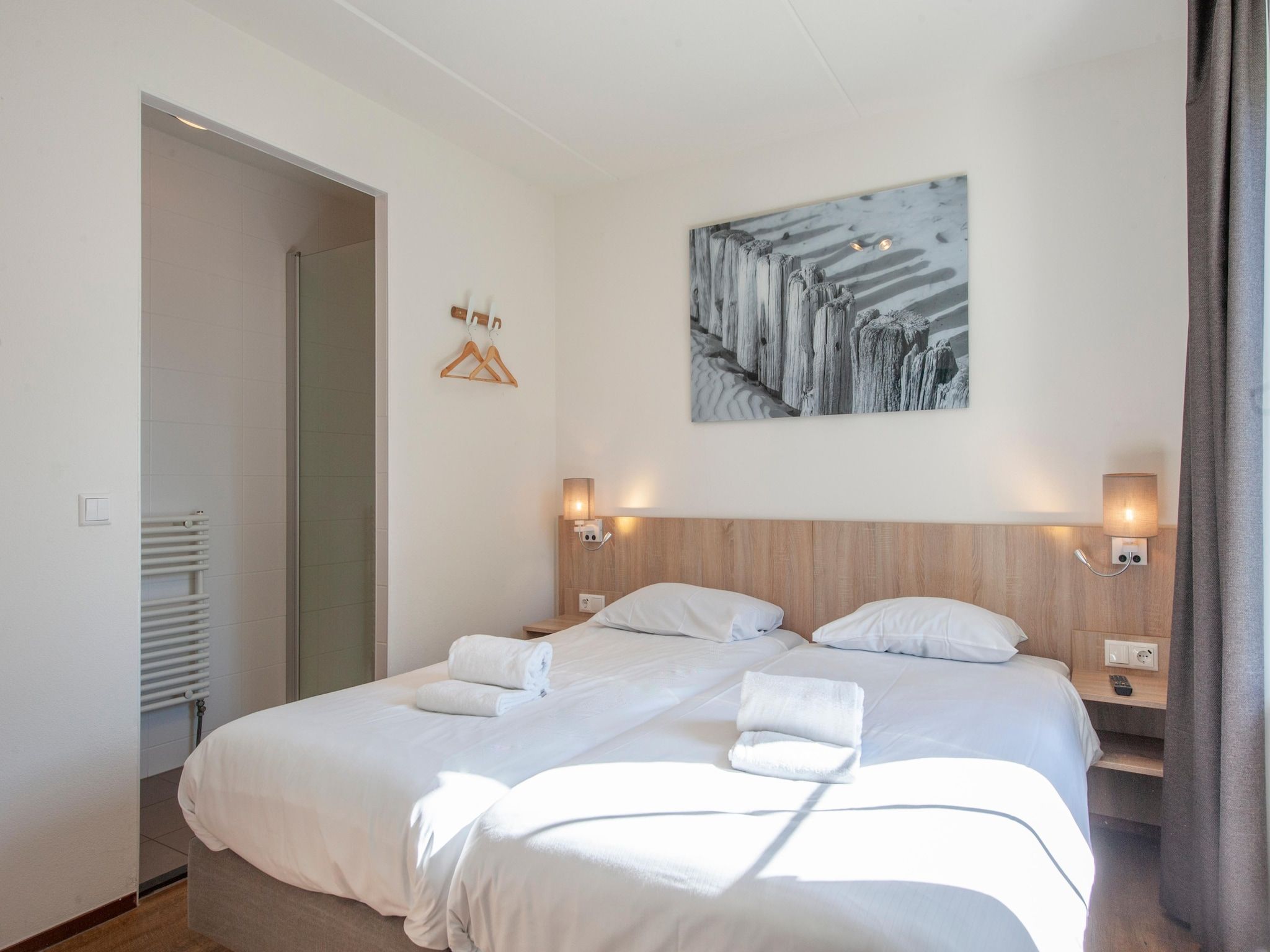 Een slaapkamer van Noordzee Résidence Cadzand-Bad 27 in Cadzand-Bad