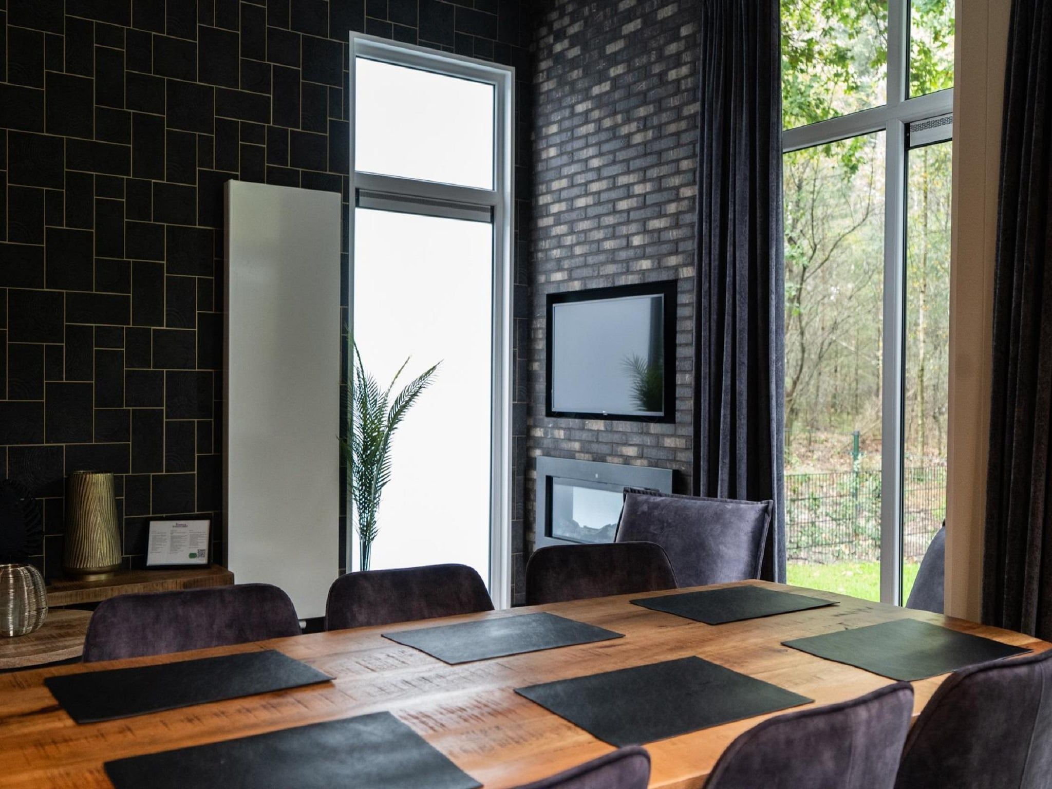 De eetkamer van Vakantiepark De Rimboe & De Woeste Hoogte 39 in Hoenderloo