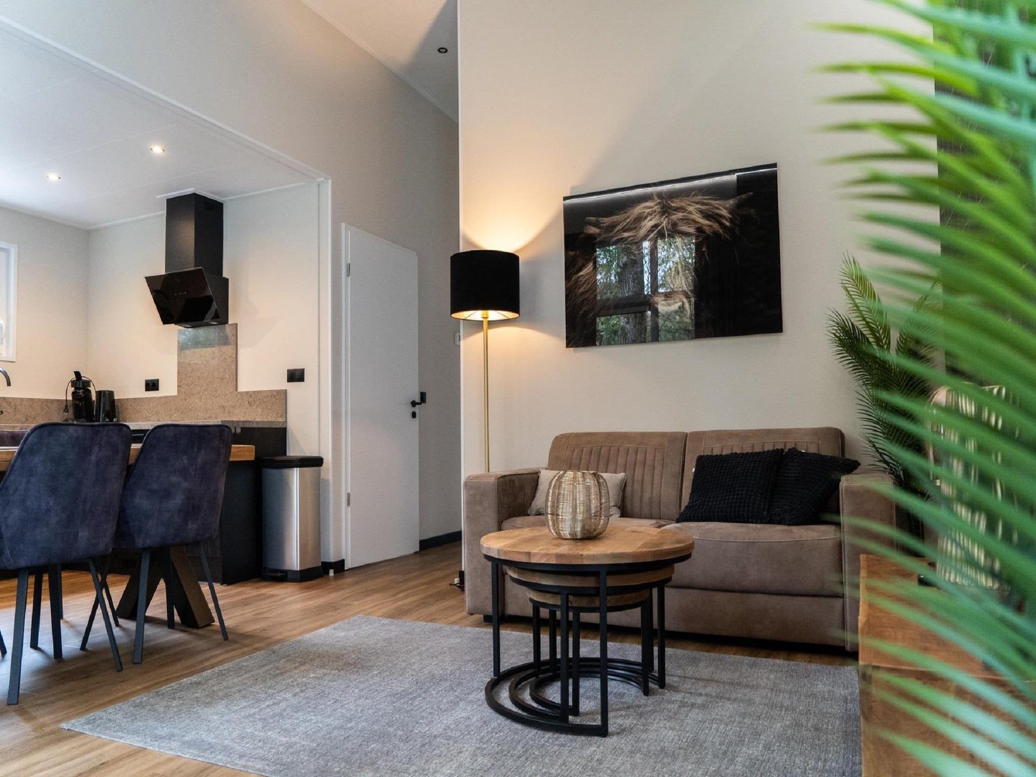 De woonkamer van Vakantiepark De Rimboe & De Woeste Hoogte 39 in Hoenderloo