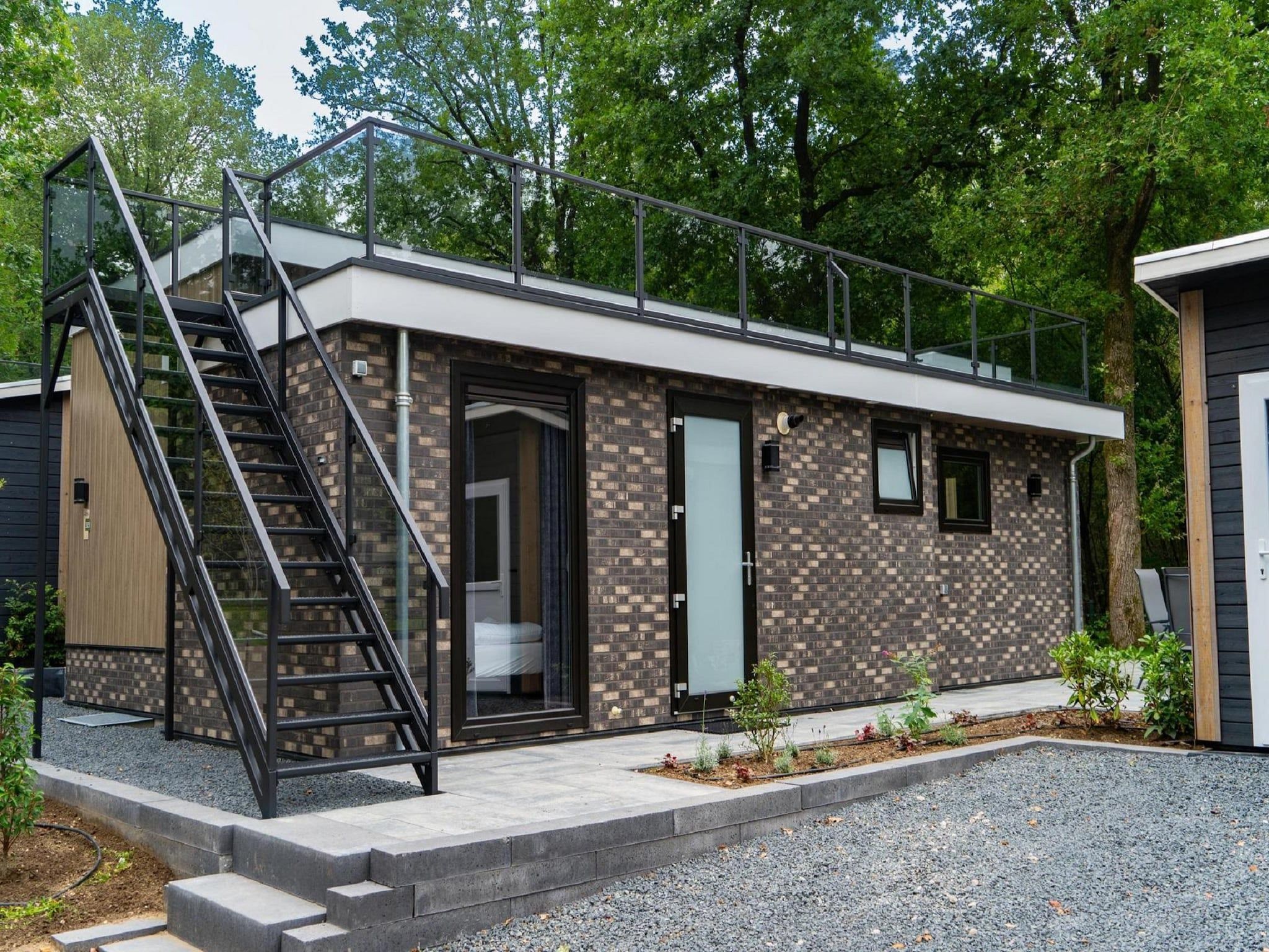 De buitenkant van Vakantiepark De Rimboe & De Woeste Hoogte 39 in Hoenderloo