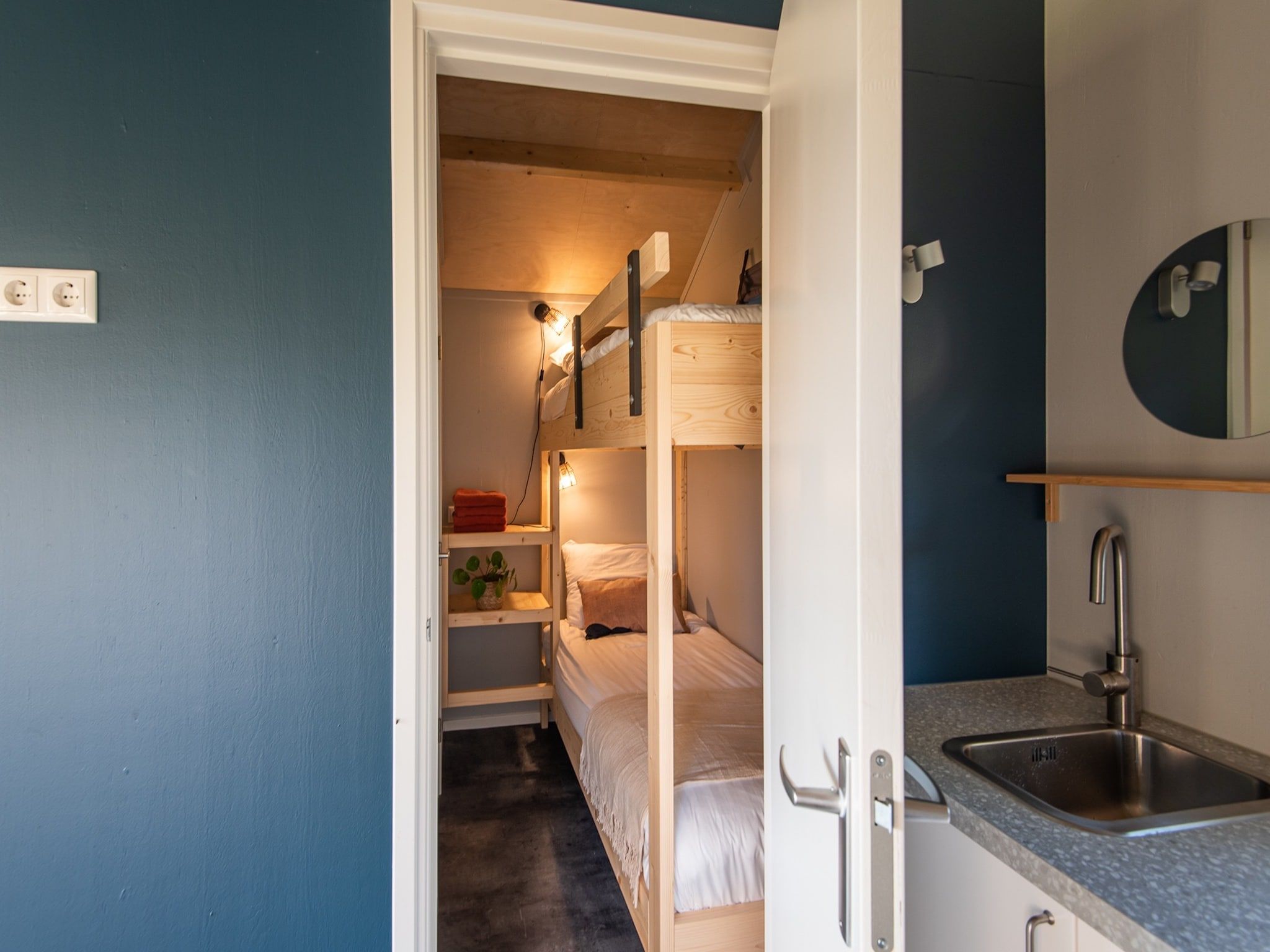 Een slaapkamer van Acker Lodges 1 in Ruinerwold