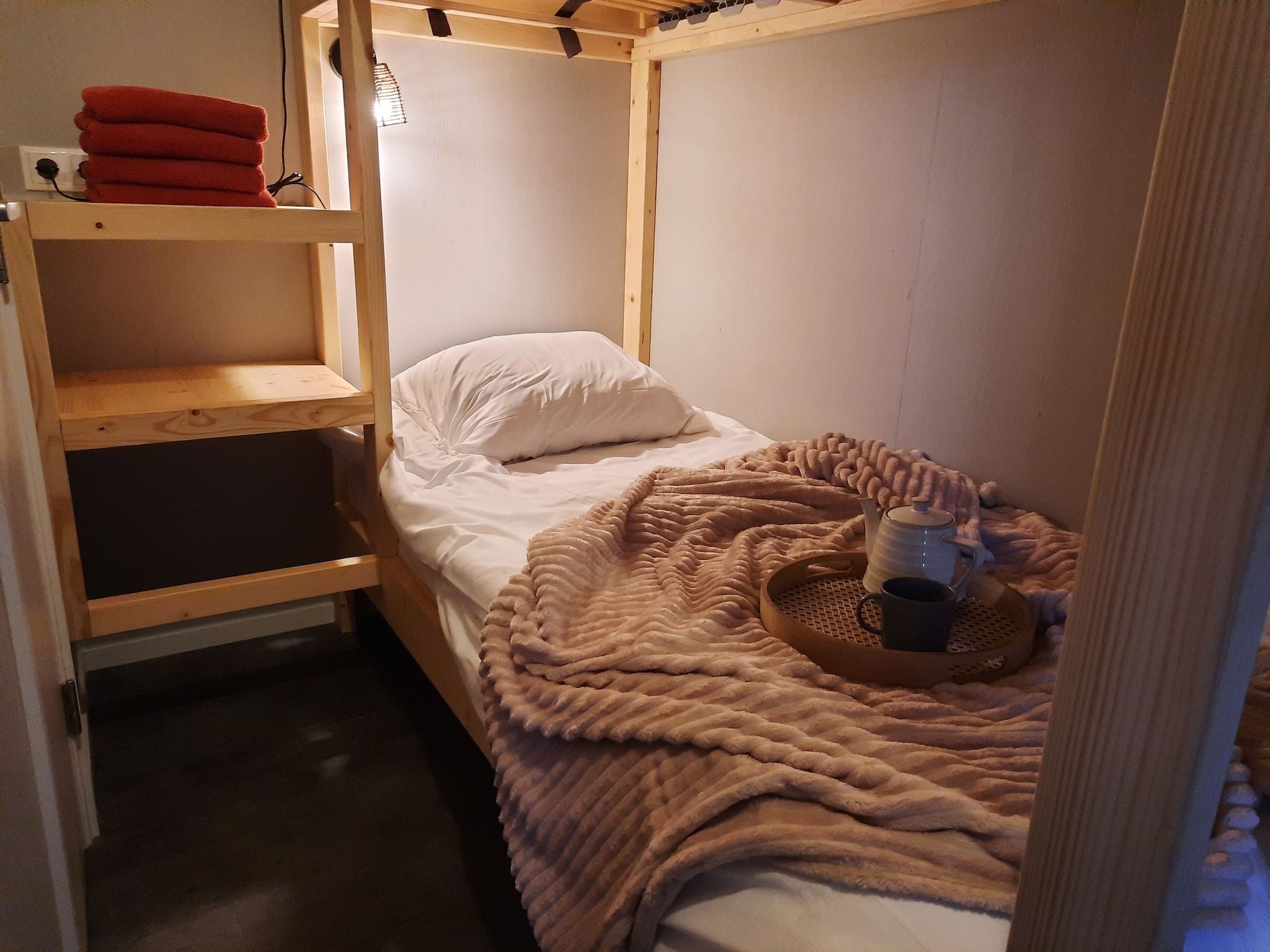 Een slaapkamer van Acker Lodges 1 in Ruinerwold