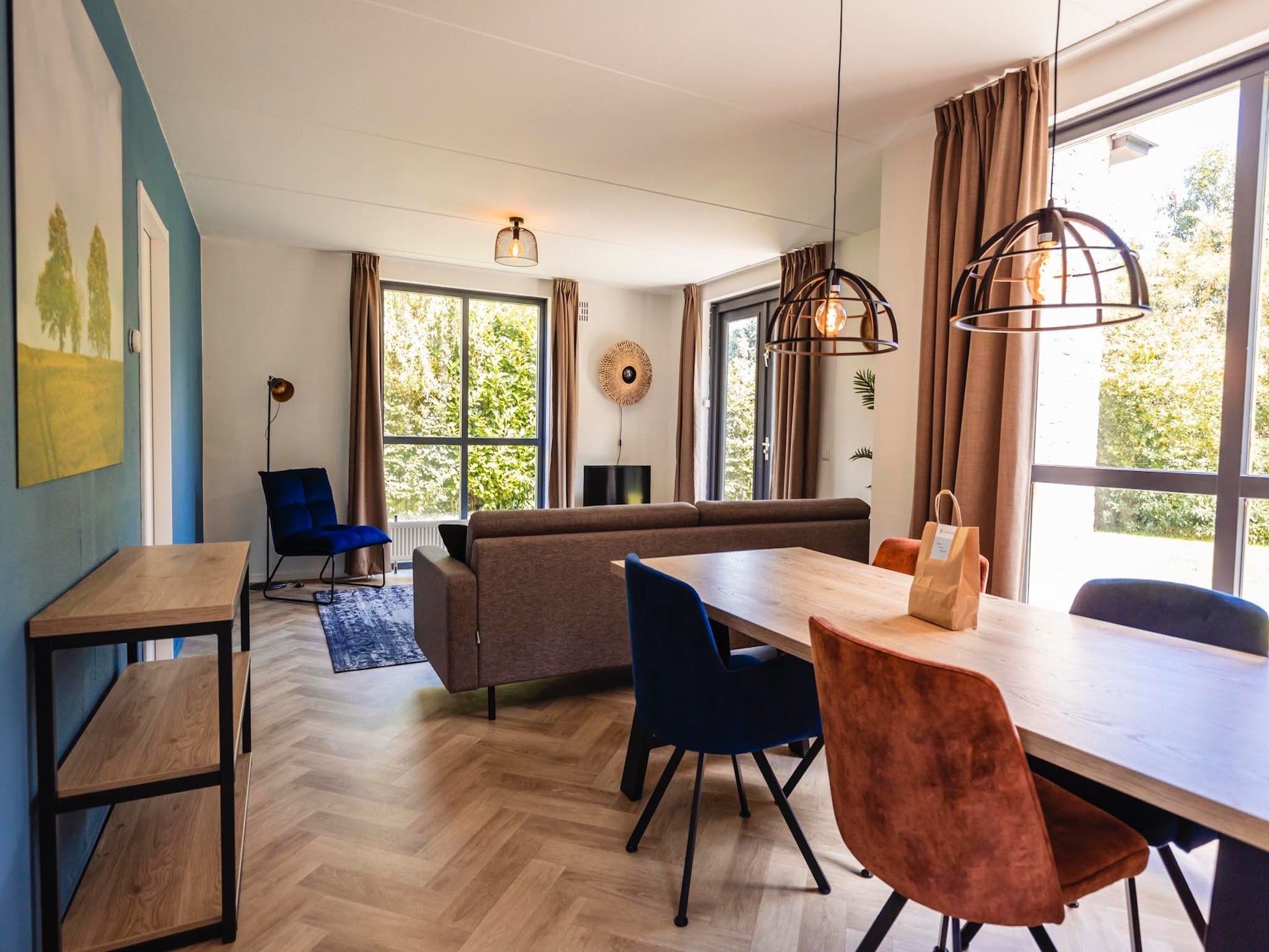 De woonkamer van Vakantiepark 't Broeckhuys 1 in Ewijk