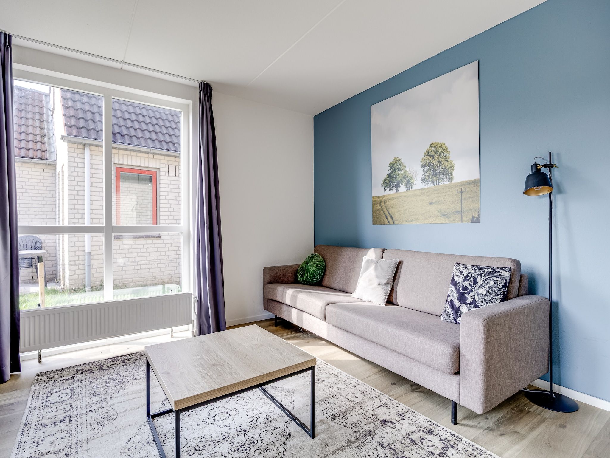 De woonkamer van Vakantiepark 't Broeckhuys 1 in Ewijk