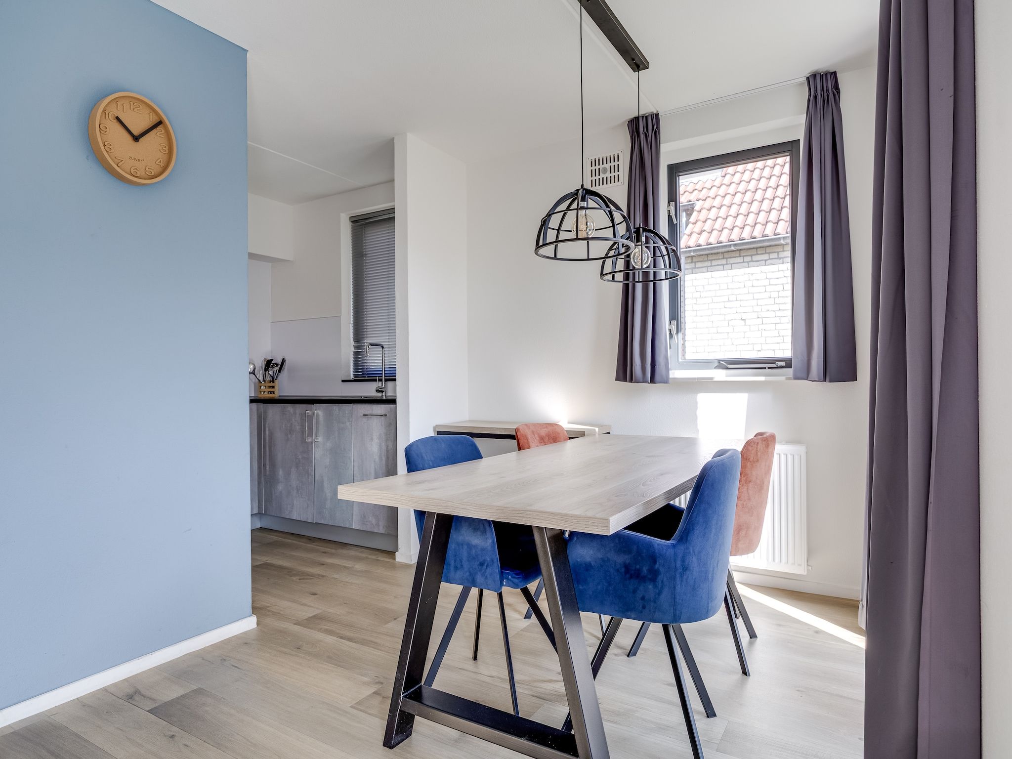 De eetkamer van Vakantiepark 't Broeckhuys 1 in Ewijk