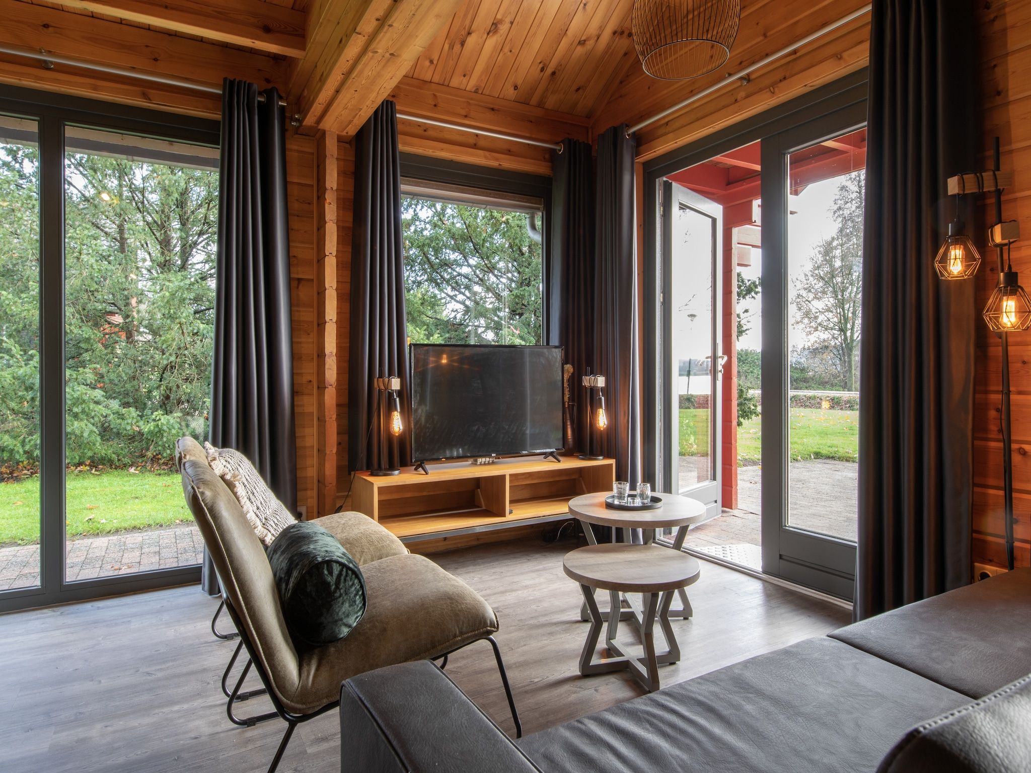 De woonkamer van Vakantiepark Klein Vink 22 in Arcen