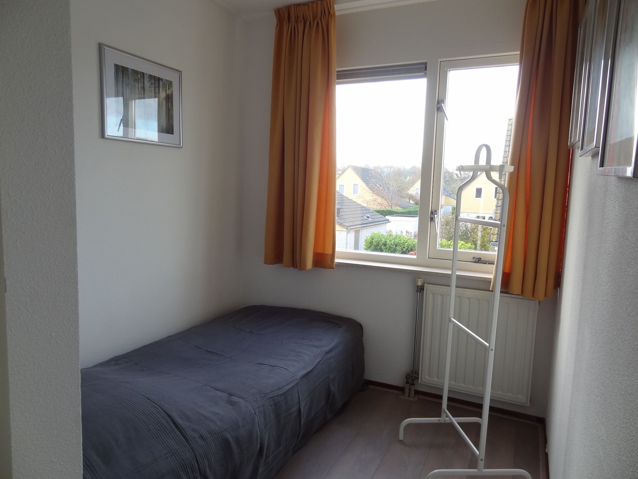 Een slaapkamer van Villapark De Oesterbaai 85 in Wemeldinge