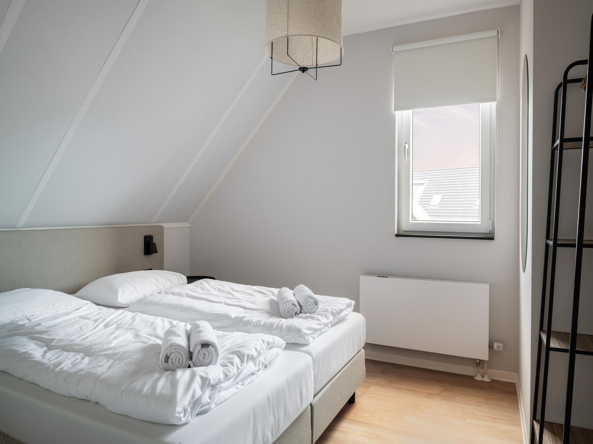 Een slaapkamer van Resort Nieuwvliet-Bad 1 in Nieuwvliet