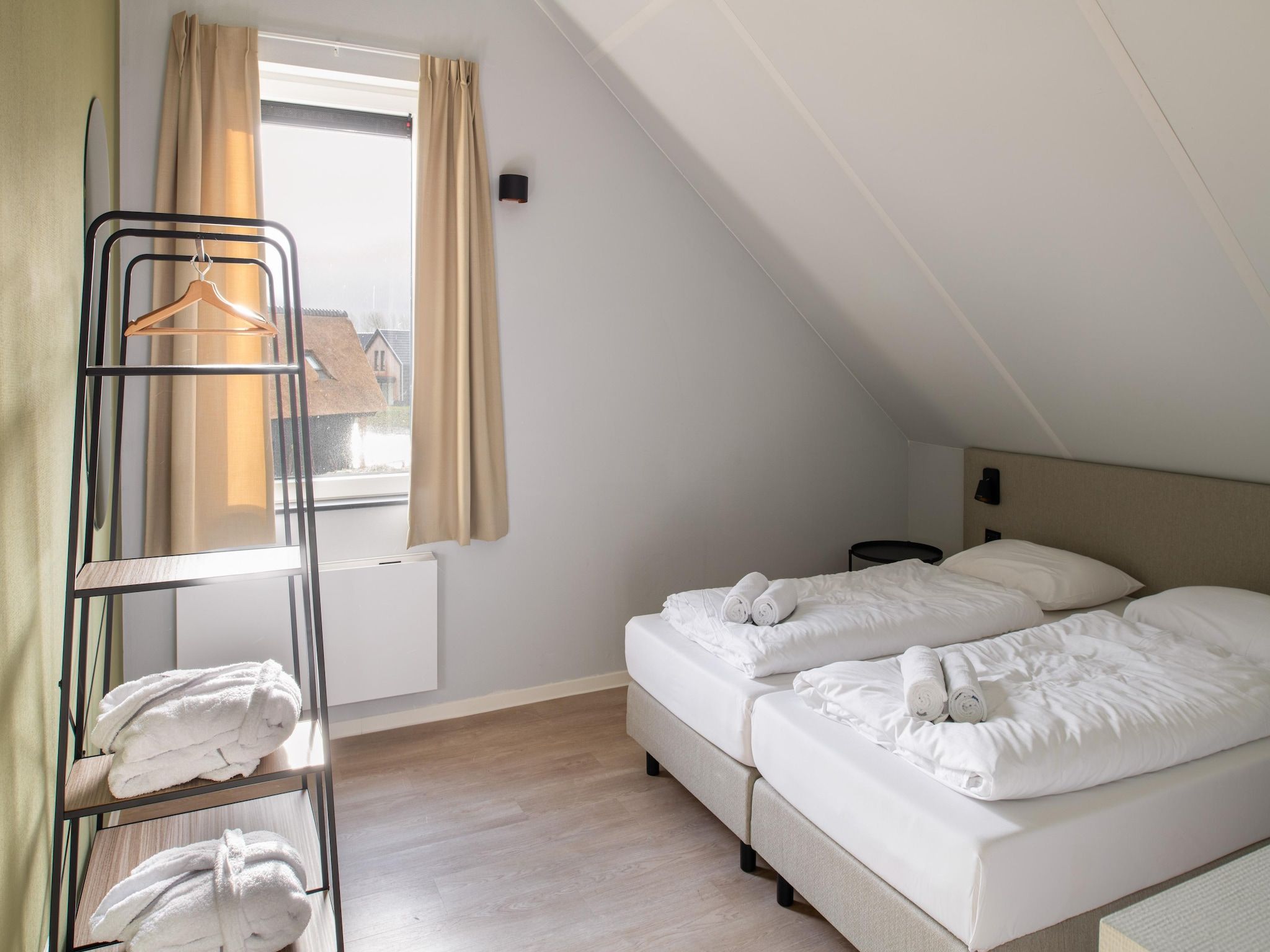 Een slaapkamer van Resort Nieuwvliet-Bad 5 in Nieuwvliet