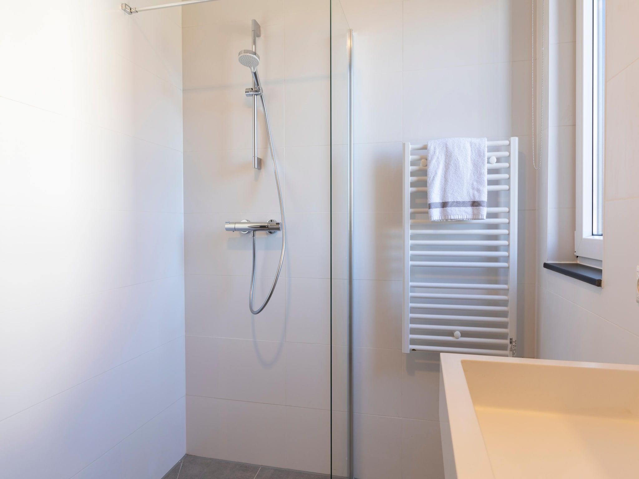 De badkamer van Resort Nieuwvliet-Bad 12 in Nieuwvliet