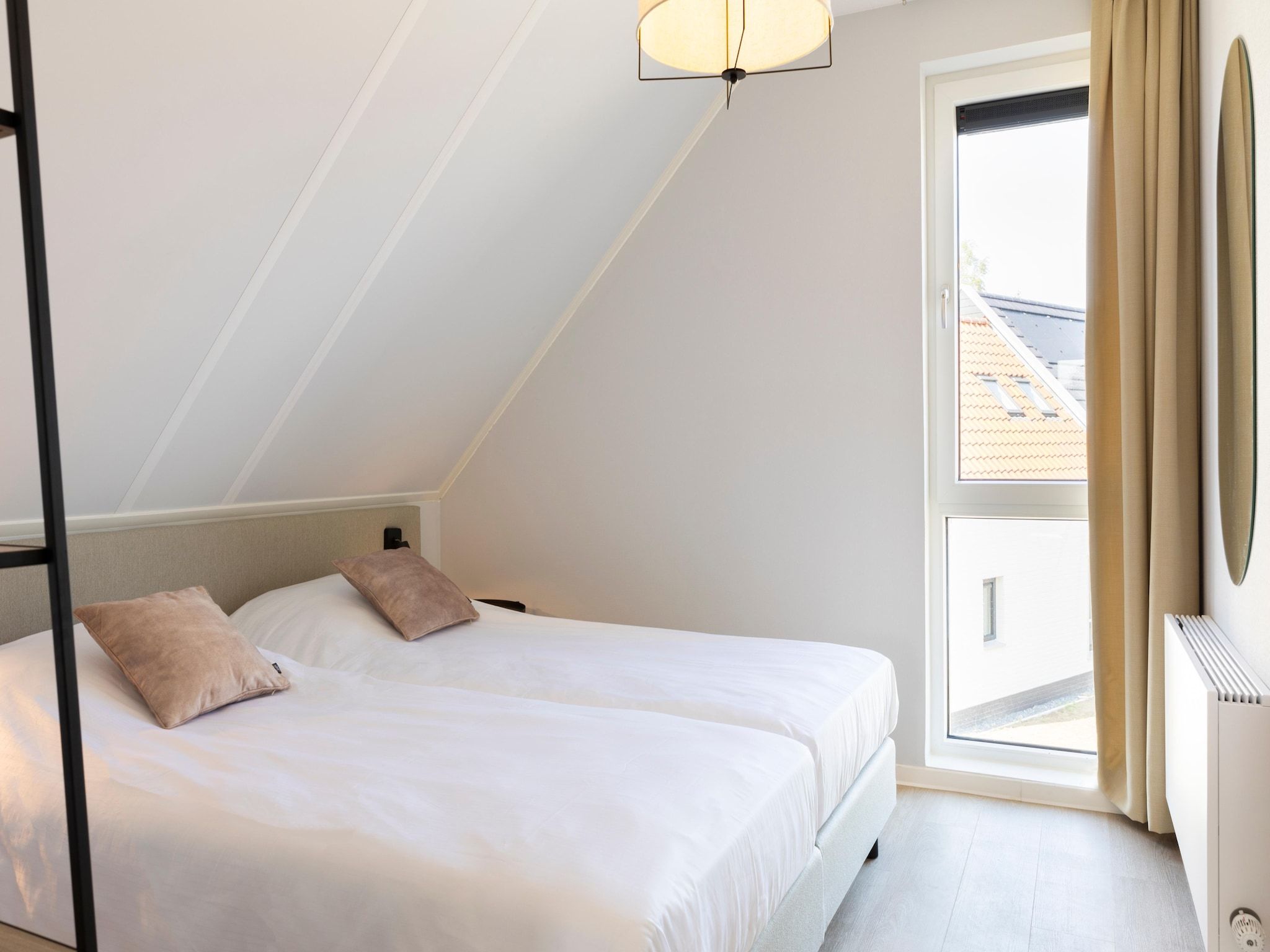 Een slaapkamer van Resort Nieuwvliet-Bad 12 in Nieuwvliet