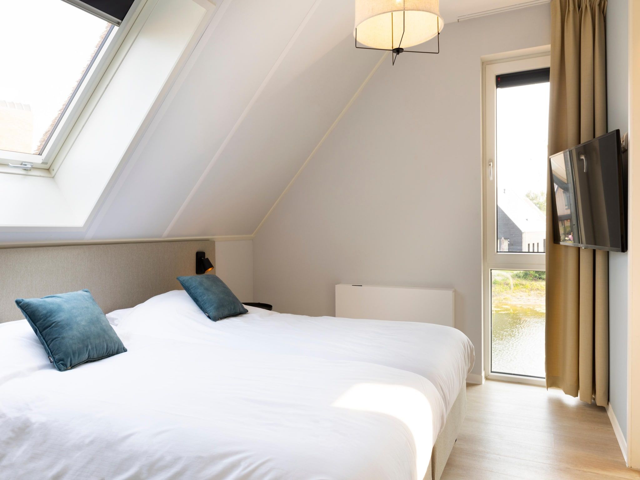 Een slaapkamer van Resort Nieuwvliet-Bad 13 in Nieuwvliet