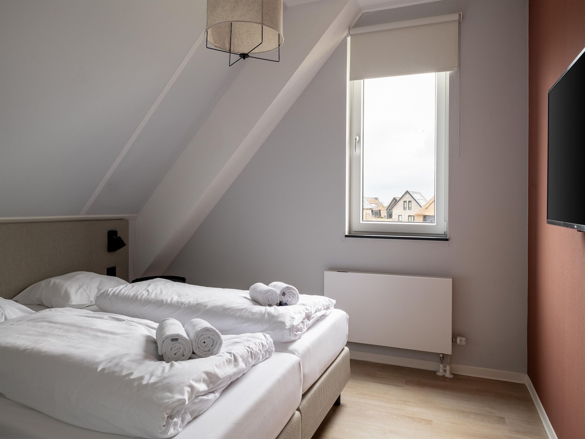 Een slaapkamer van Resort Nieuwvliet-Bad 18 in Nieuwvliet