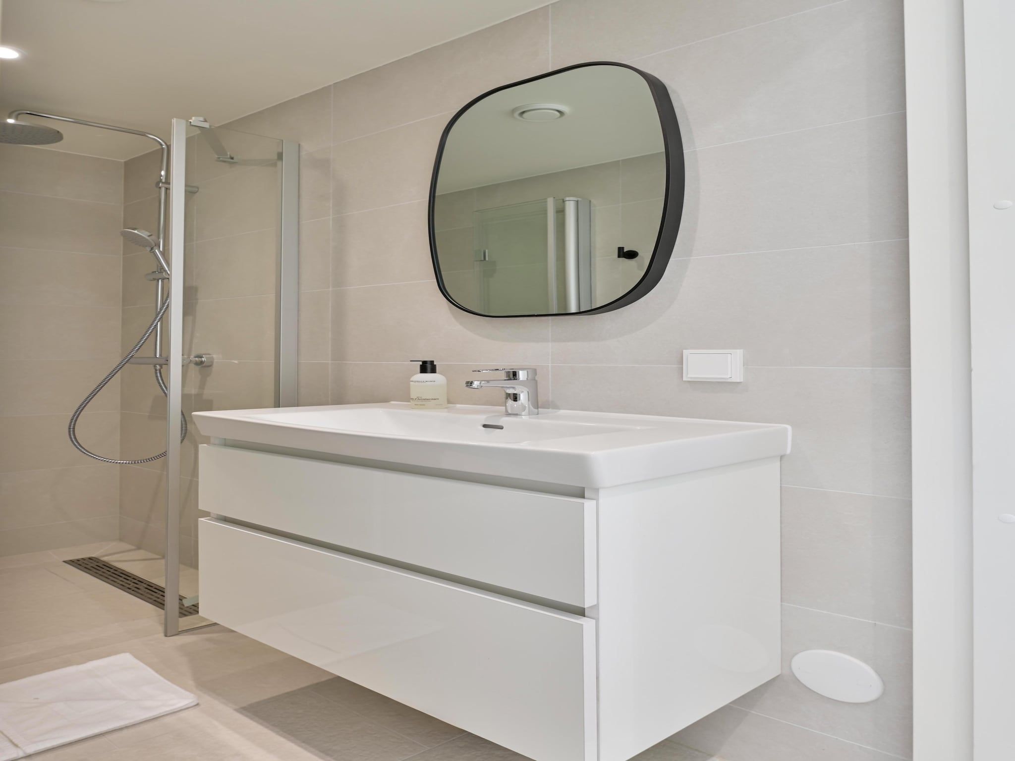 De badkamer van Resort de Parel 5 in Zeewolde