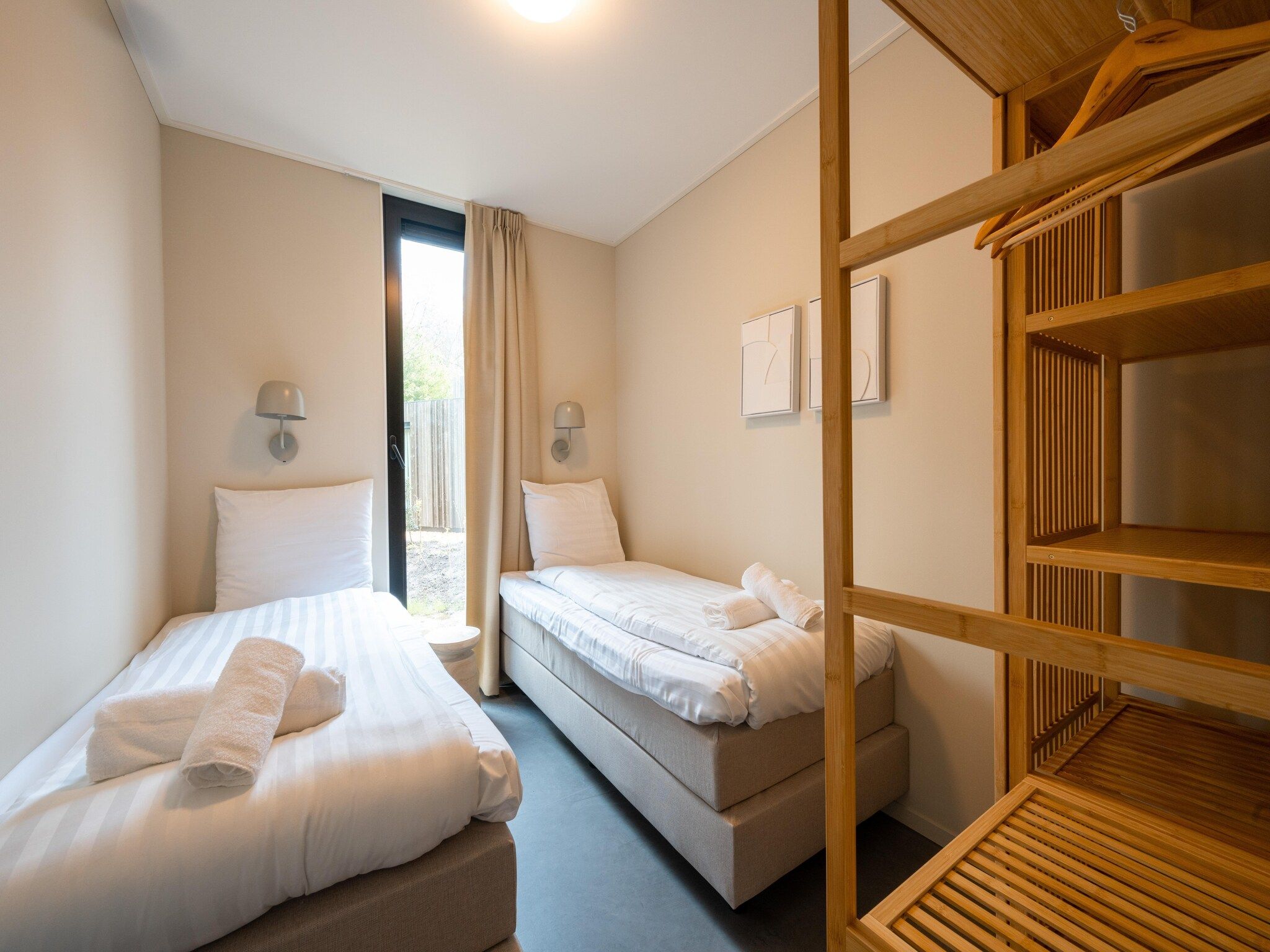 Een slaapkamer van Resort de Parel 11 in Zeewolde