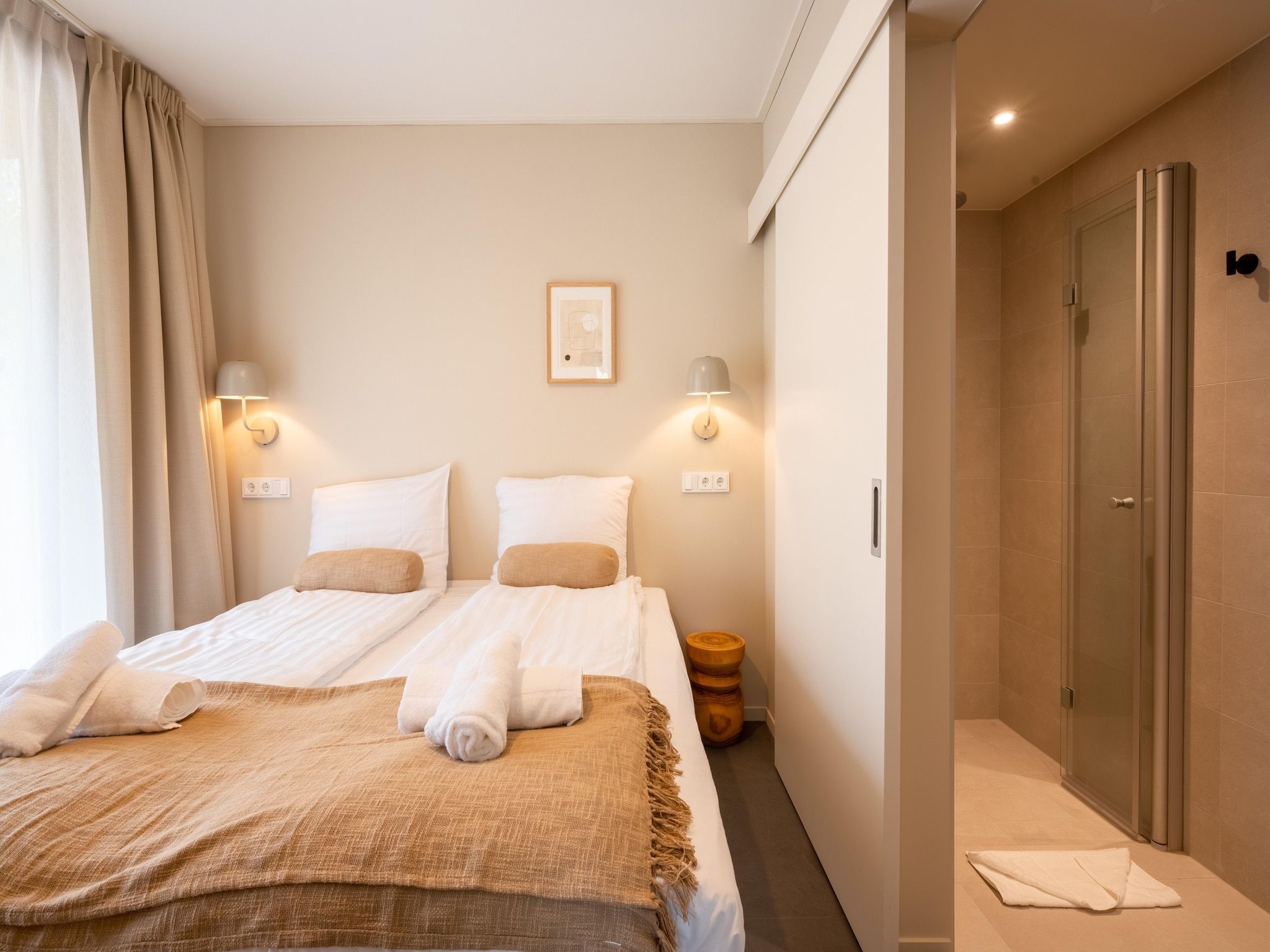 Een slaapkamer van Resort de Parel 12 in Zeewolde