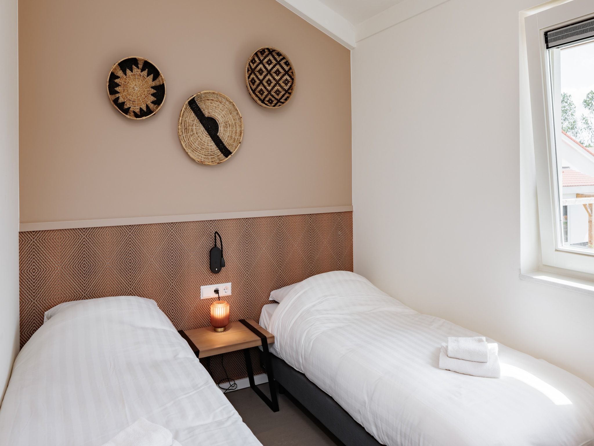 Een slaapkamer van Duinresort Dunimar 4 in Noordwijkerhout