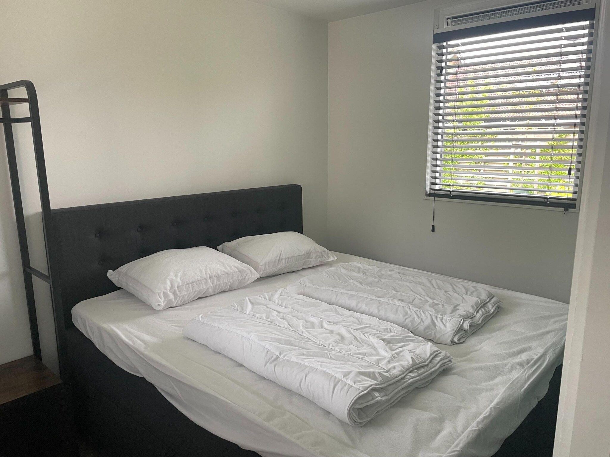 Een slaapkamer van Recreatiepark Idskenhuizen 11 in Idskenhuizen