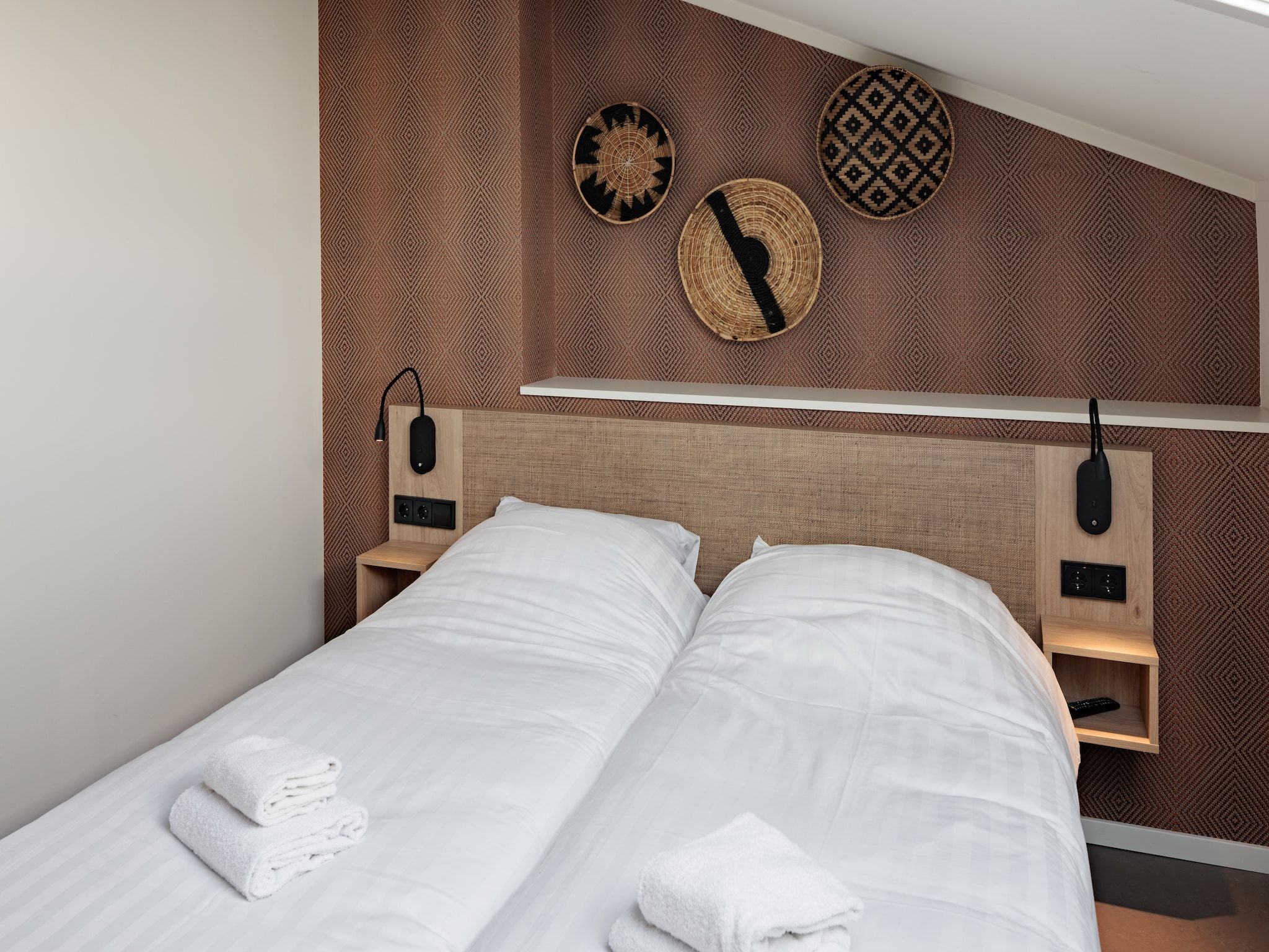 Een slaapkamer van Duinresort Dunimar 5 in Noordwijkerhout