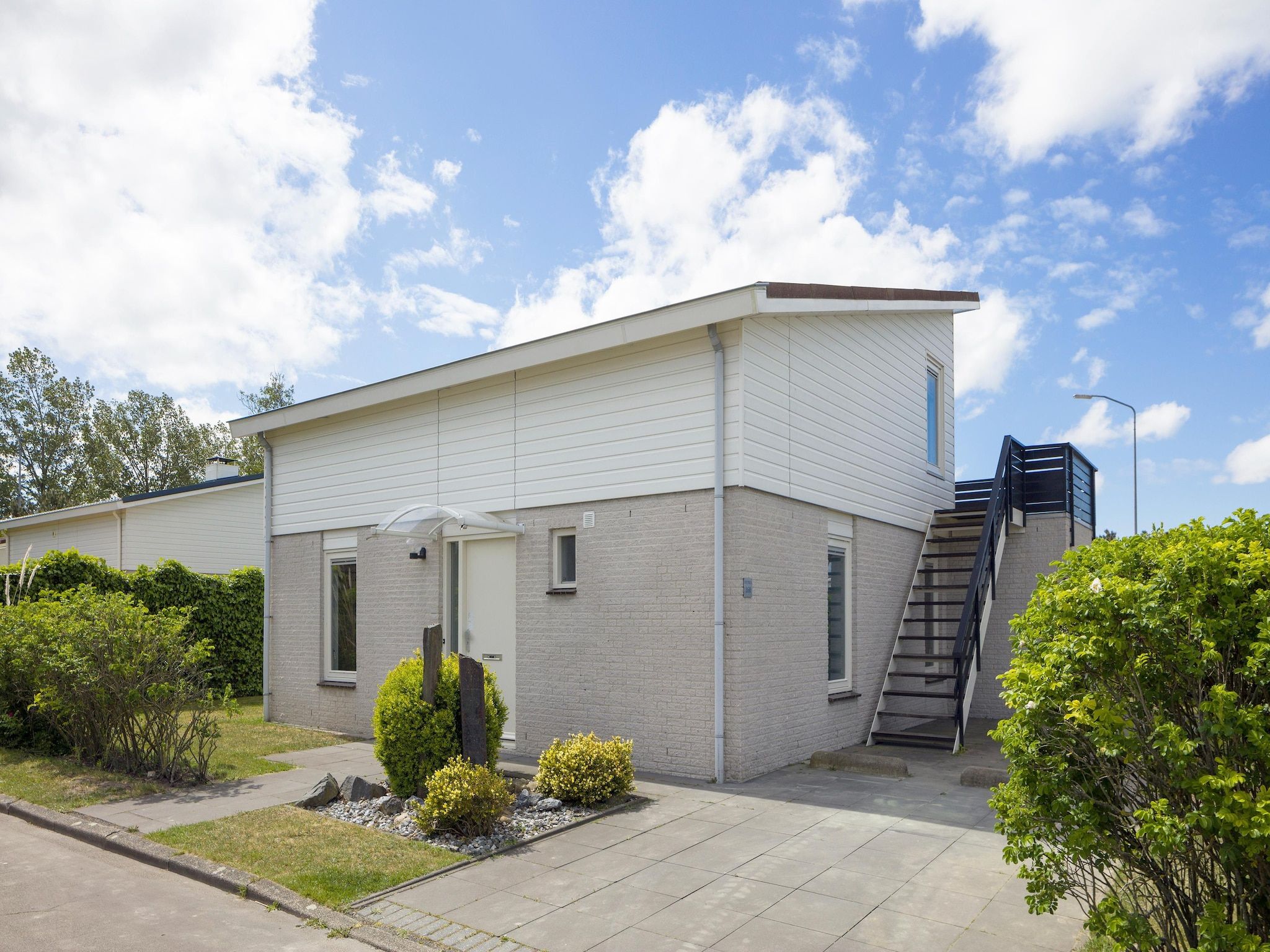 De buitenkant van Roompot Beach Resort 25 in Kamperland