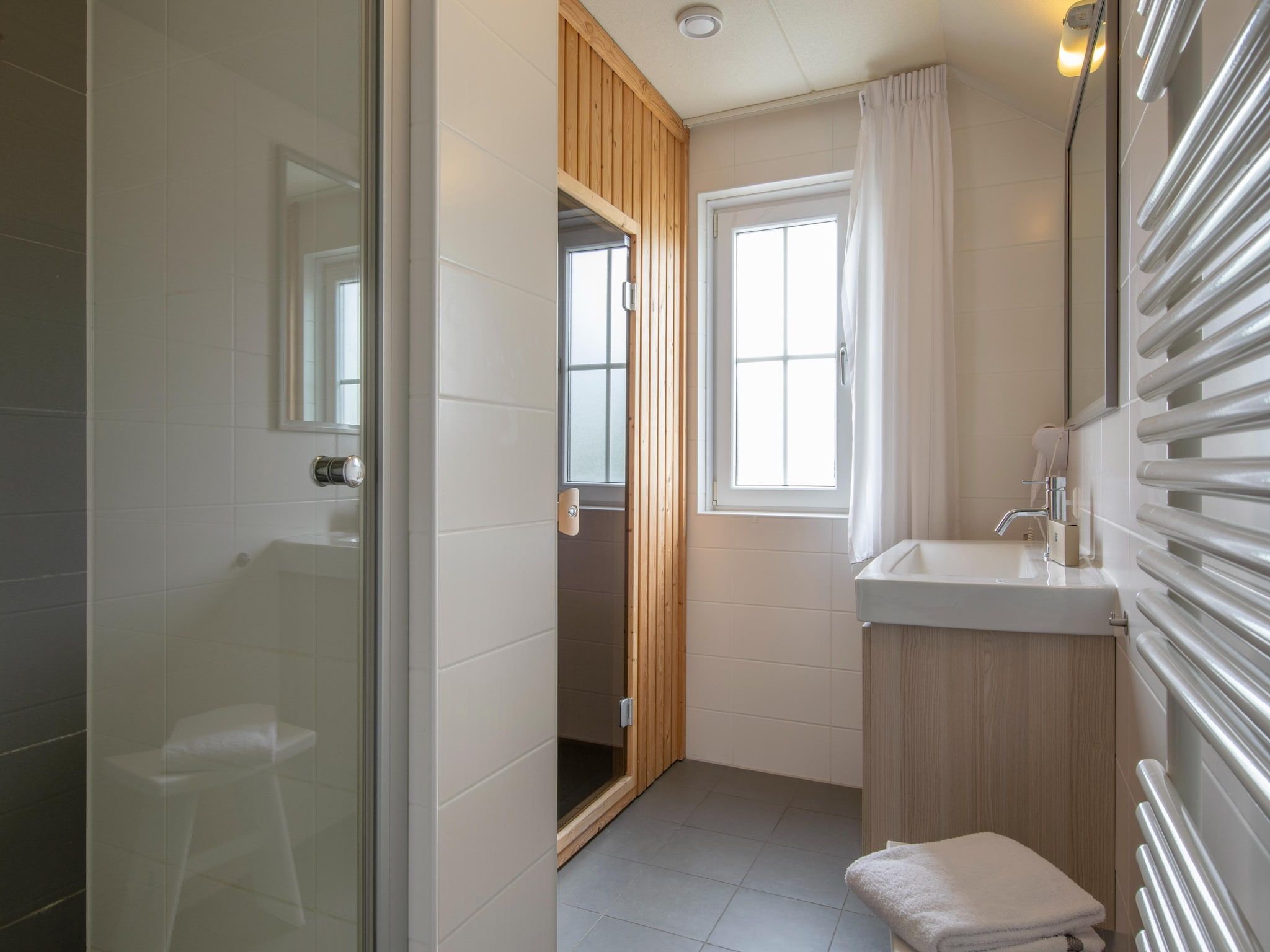 De badkamer van Noordzee Résidence Cadzand-Bad 10 in Cadzand-Bad