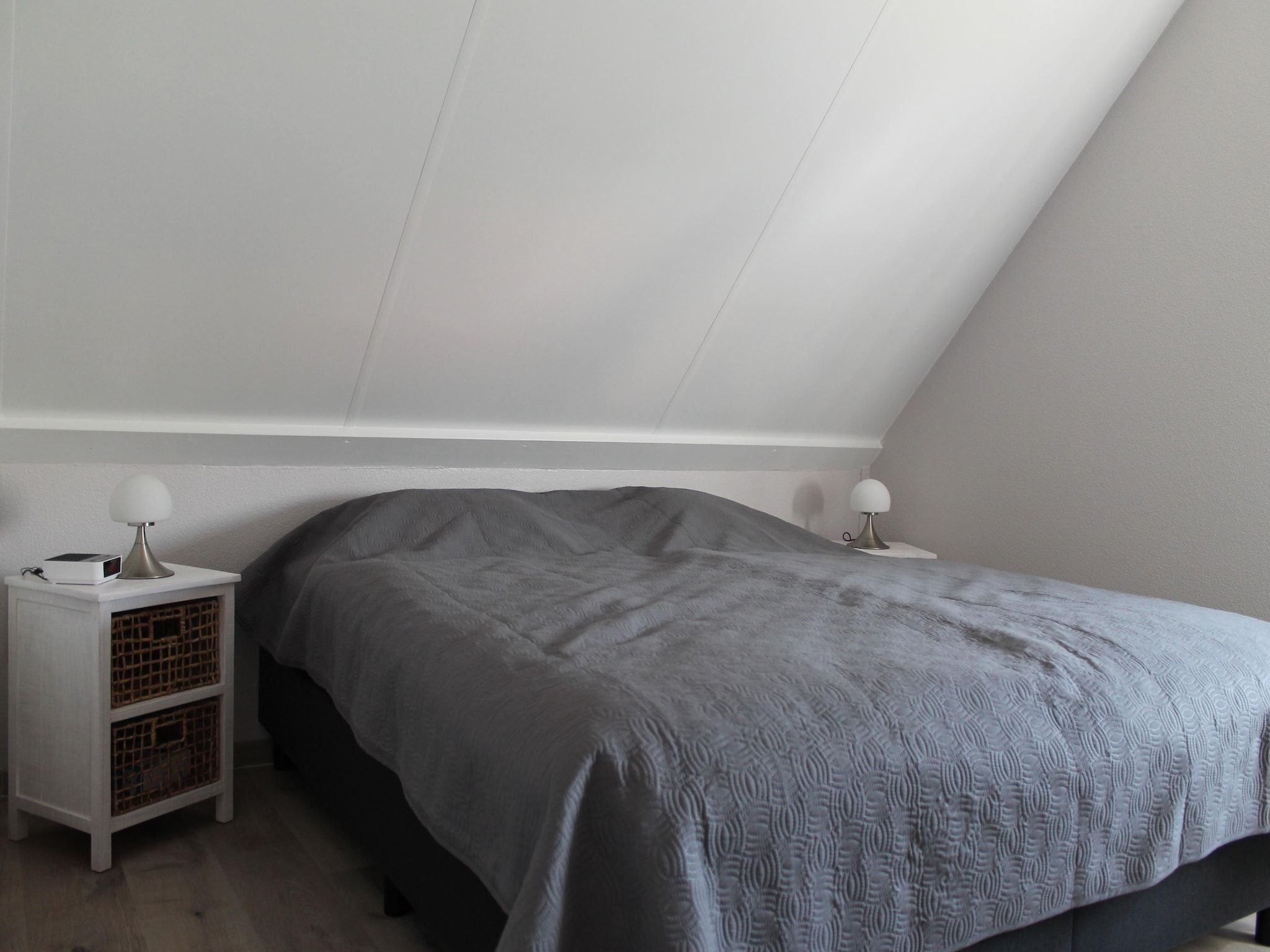 Een slaapkamer van Villapark De Oesterbaai 21 in Wemeldinge