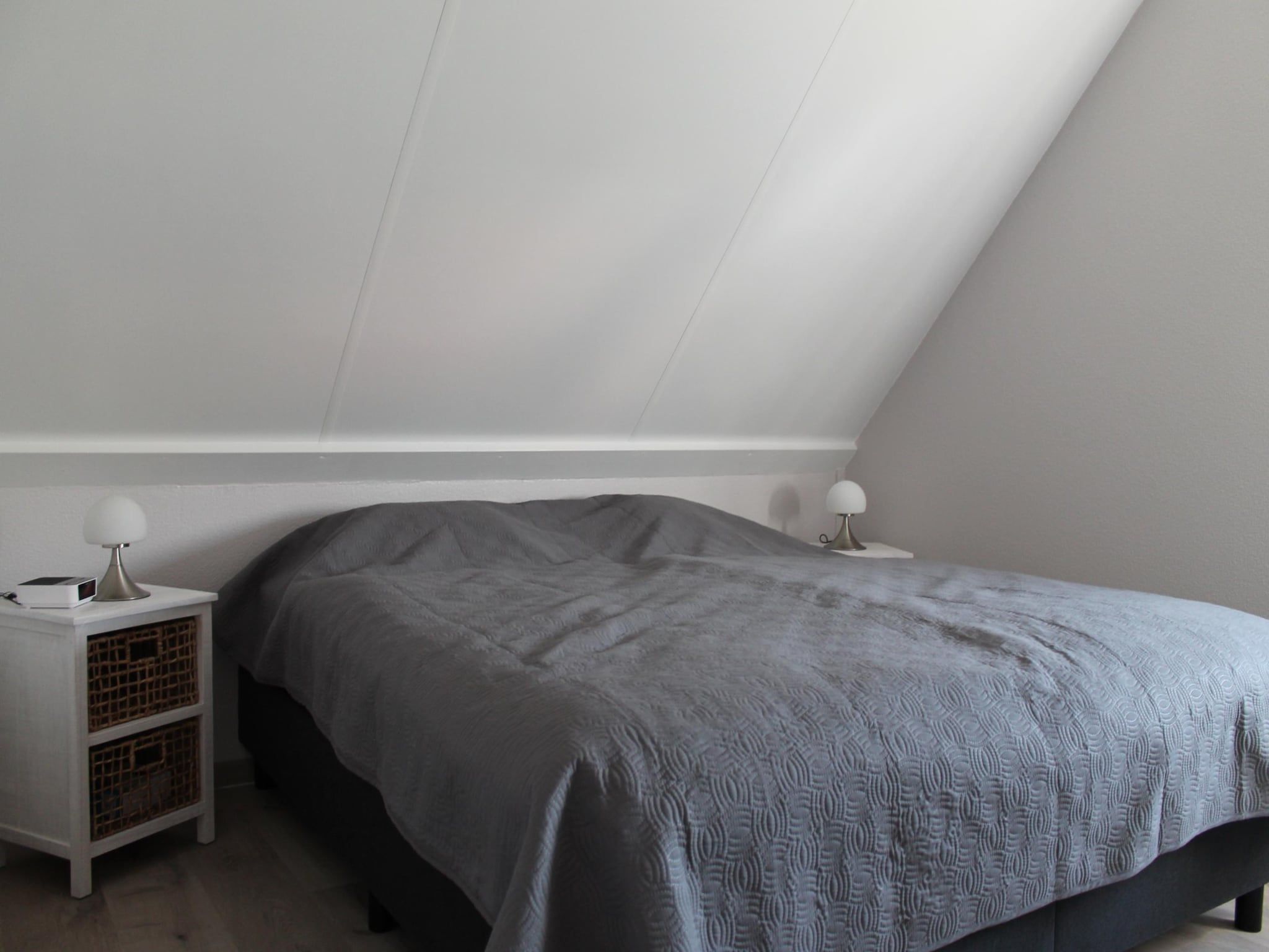 Een slaapkamer van Villapark De Oesterbaai 21 in Wemeldinge