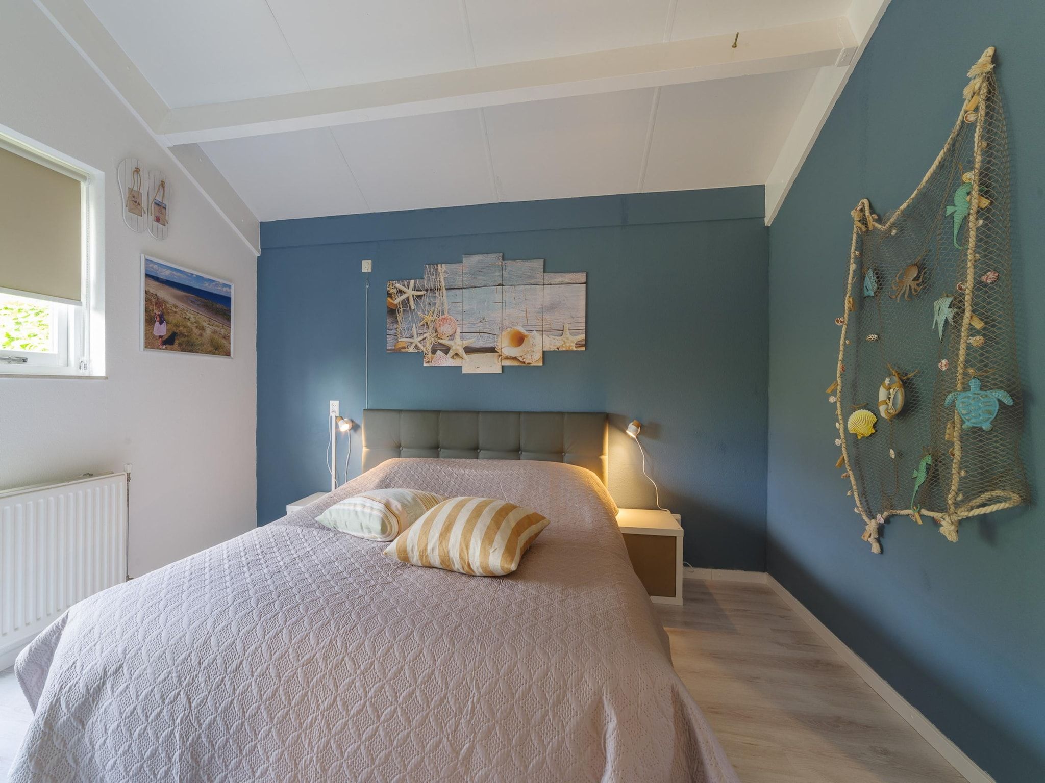 Een slaapkamer van Villapark De Oesterbaai 68 in Wemeldinge