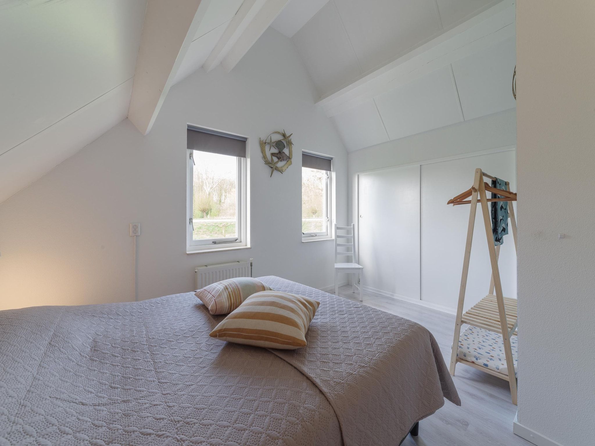 Een slaapkamer van Villapark De Oesterbaai 68 in Wemeldinge