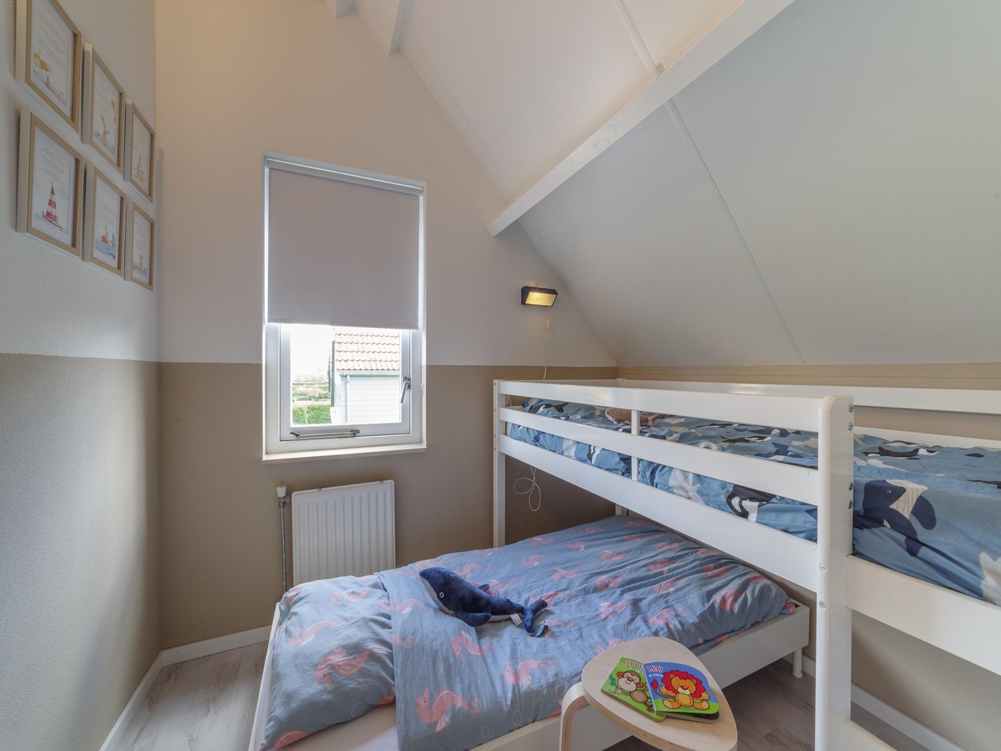 Een slaapkamer van Villapark De Oesterbaai 68 in Wemeldinge